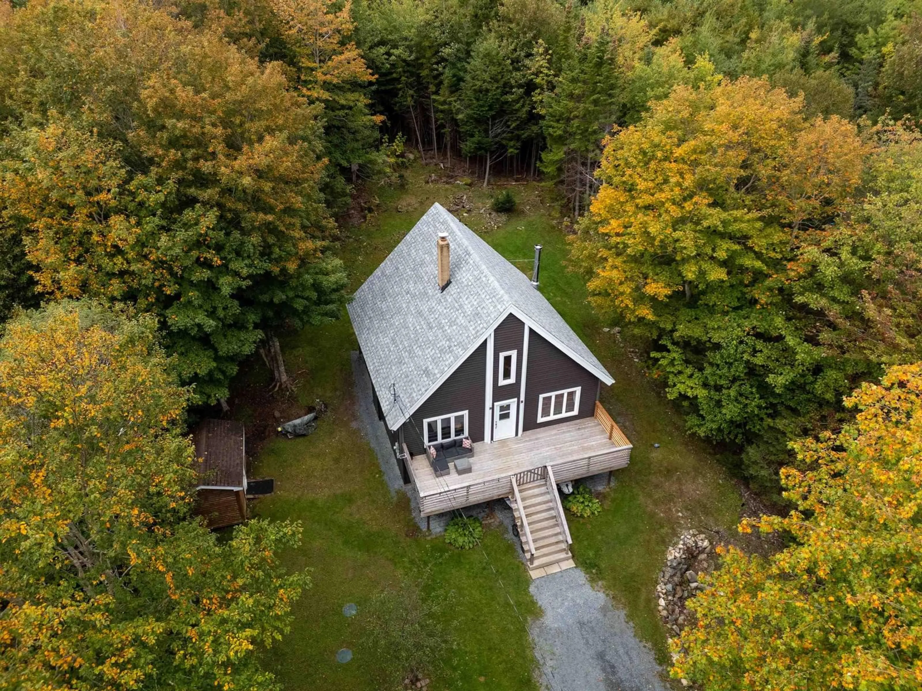 A pic from outside/outdoor area/front of a property/back of a property/a pic from drone, unknown for 164 Myra Rd, Porters Lake Nova Scotia B3E 1G1