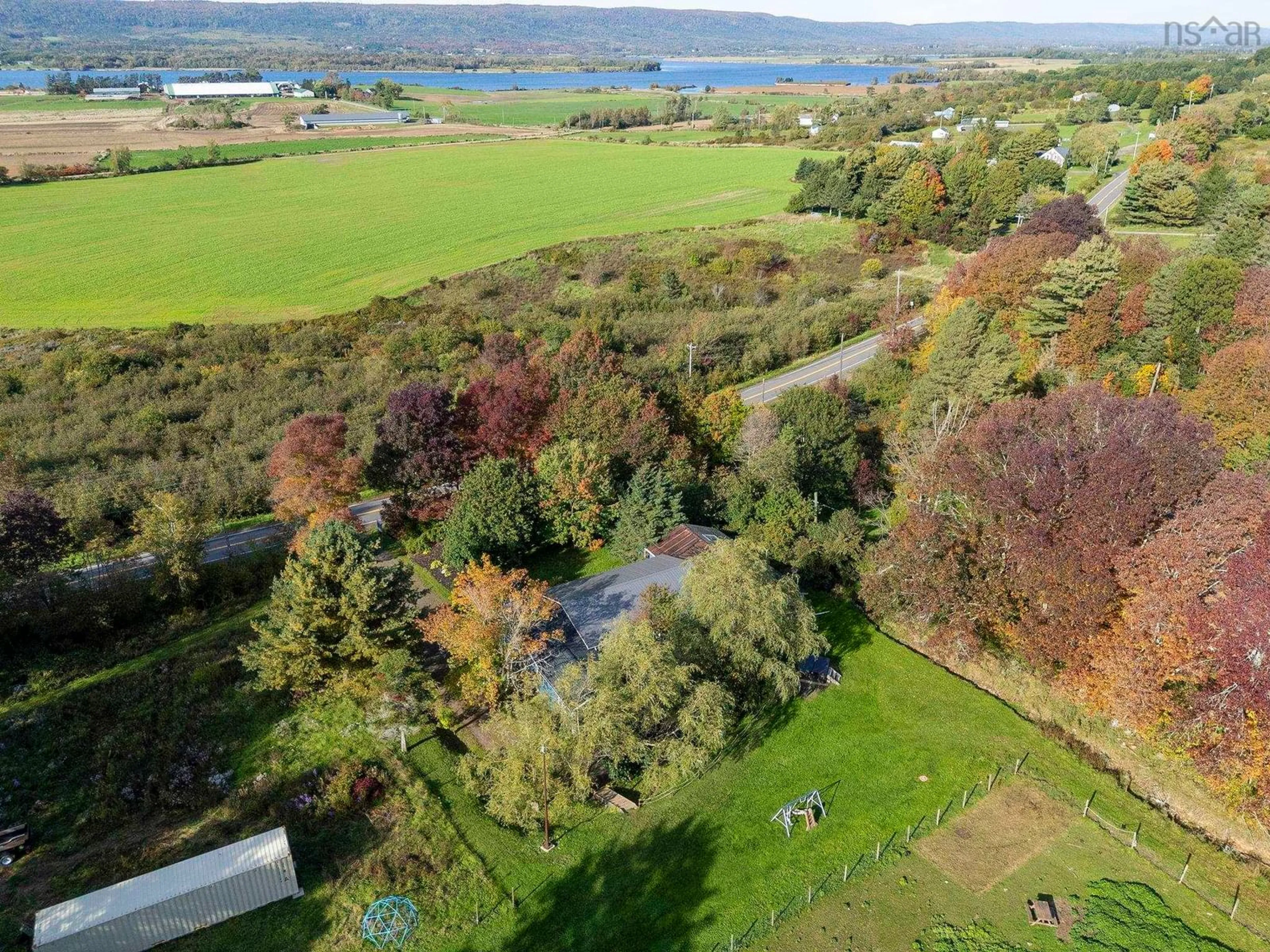 A pic from outside/outdoor area/front of a property/back of a property/a pic from drone, water/lake/river/ocean view for 1260 Highway 201, Round Hill Nova Scotia B0S 1A0