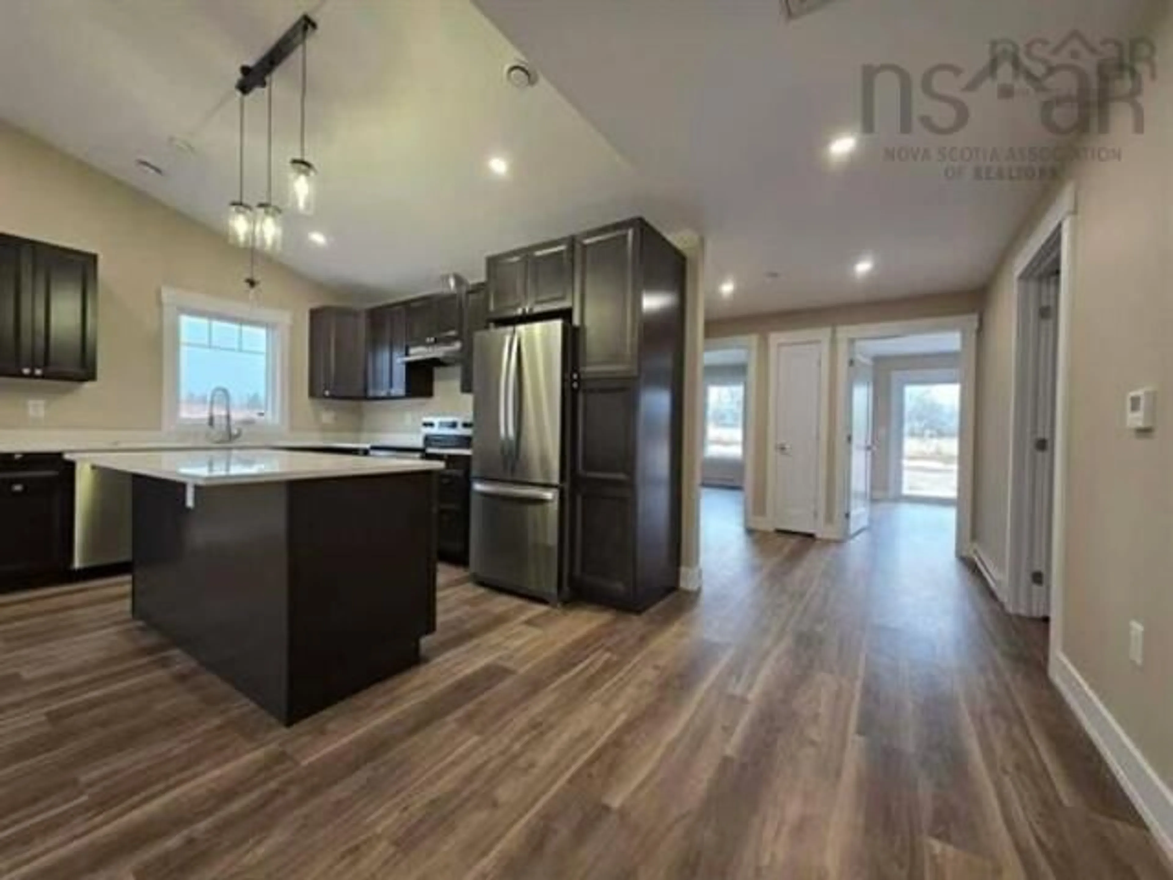 Open concept kitchen, wood/laminate floor for 56 Summer Hill Place, Upper Onslow Nova Scotia B6L 0G9