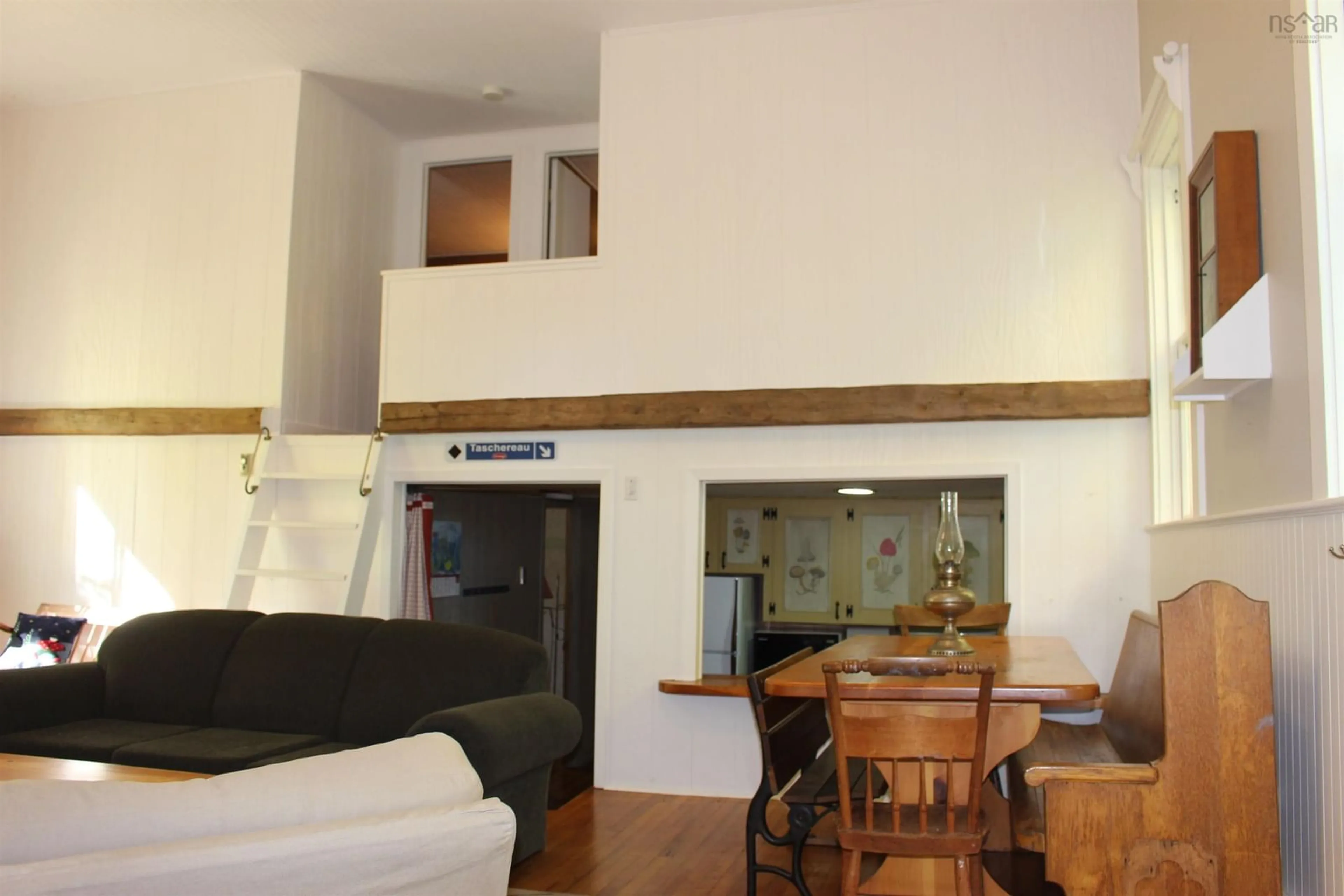 Living room with furniture, wood/laminate floor for 889 Highway 246, Wentworth Nova Scotia B0M 1Z0