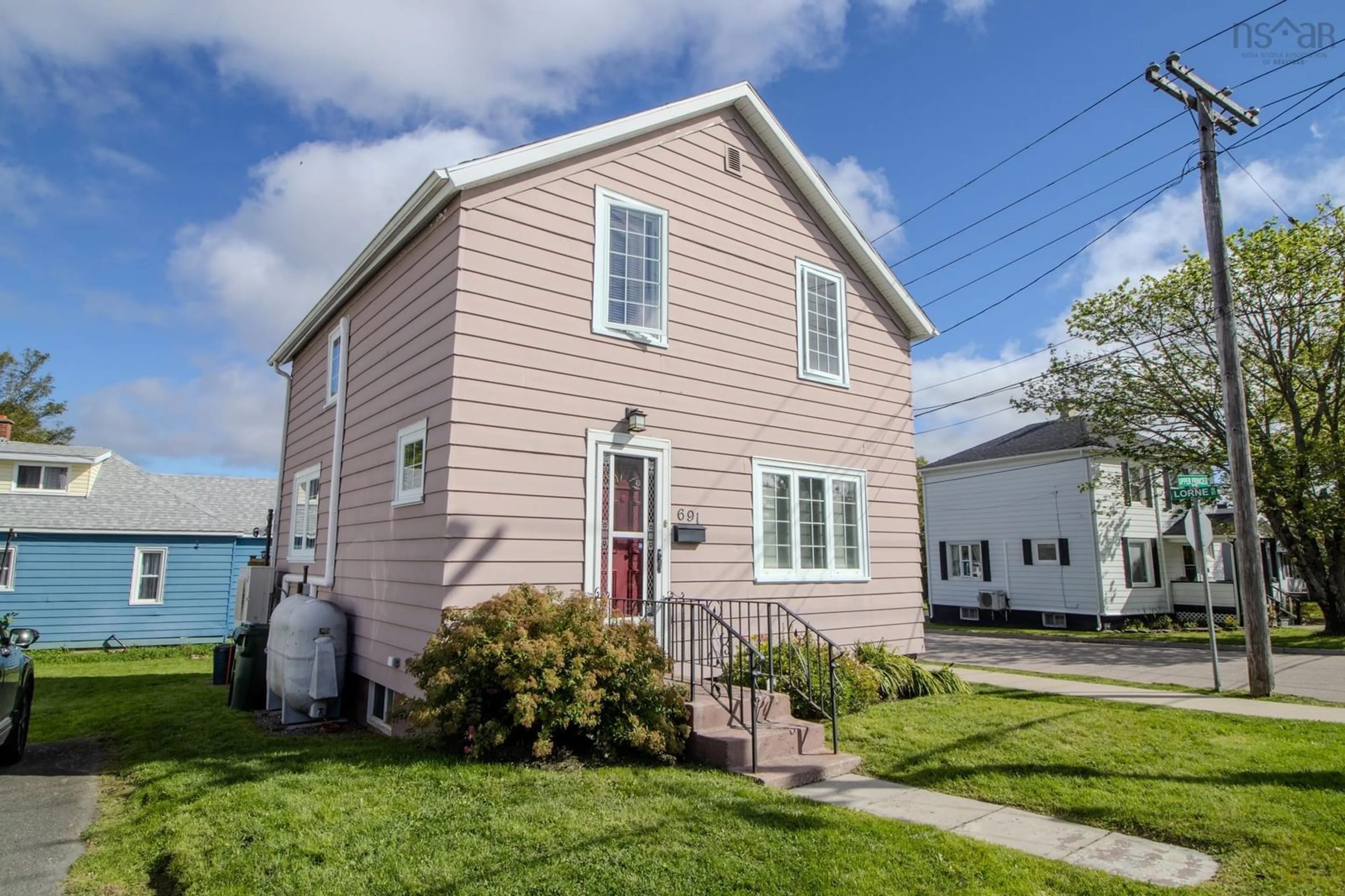 Home with vinyl exterior material, street for 691 Upper Prince St, Sydney Nova Scotia B1P 5N2