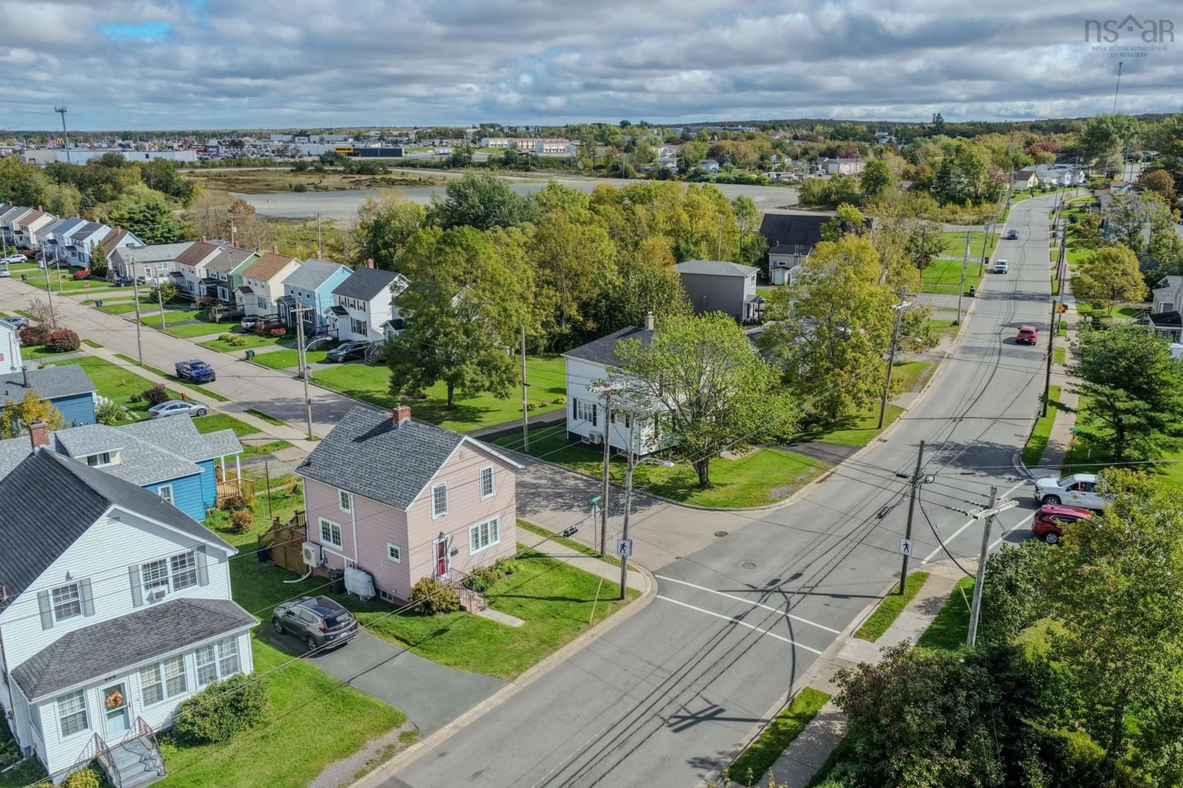 A pic from outside/outdoor area/front of a property/back of a property/a pic from drone, street for 691 Upper Prince St, Sydney Nova Scotia B1P 5N2