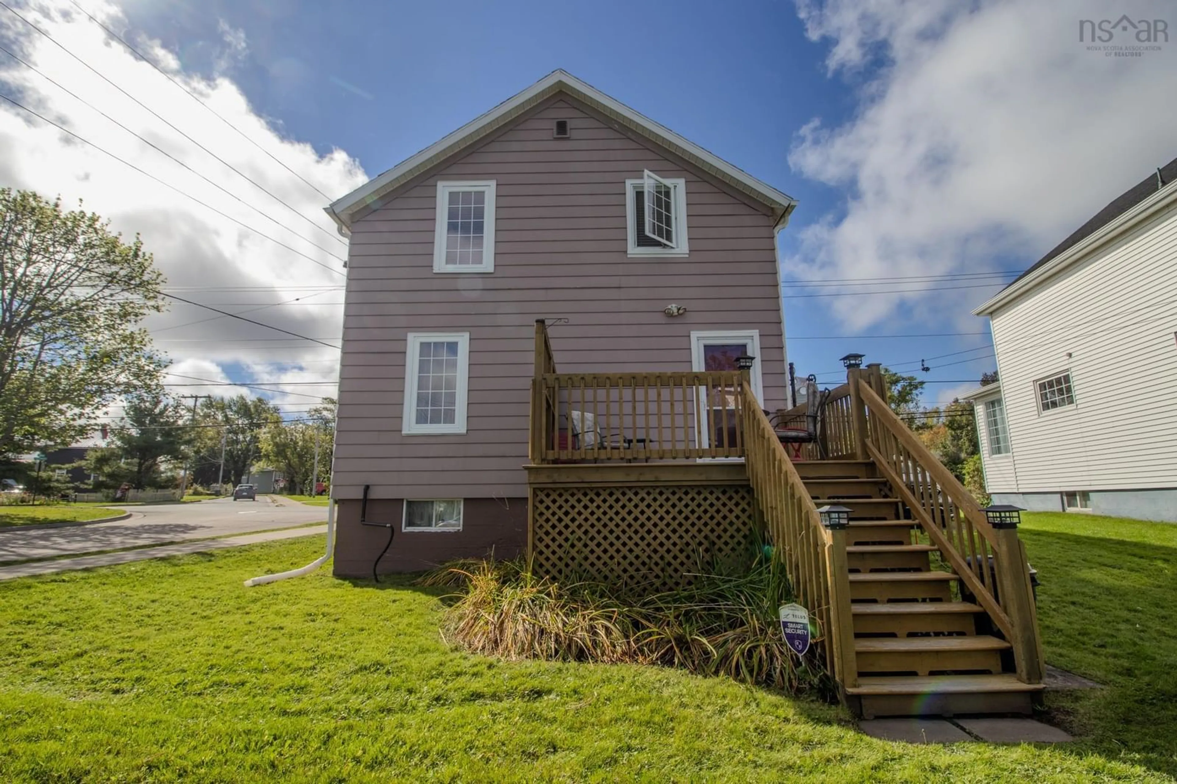 Home with vinyl exterior material, street for 691 Upper Prince St, Sydney Nova Scotia B1P 5N2
