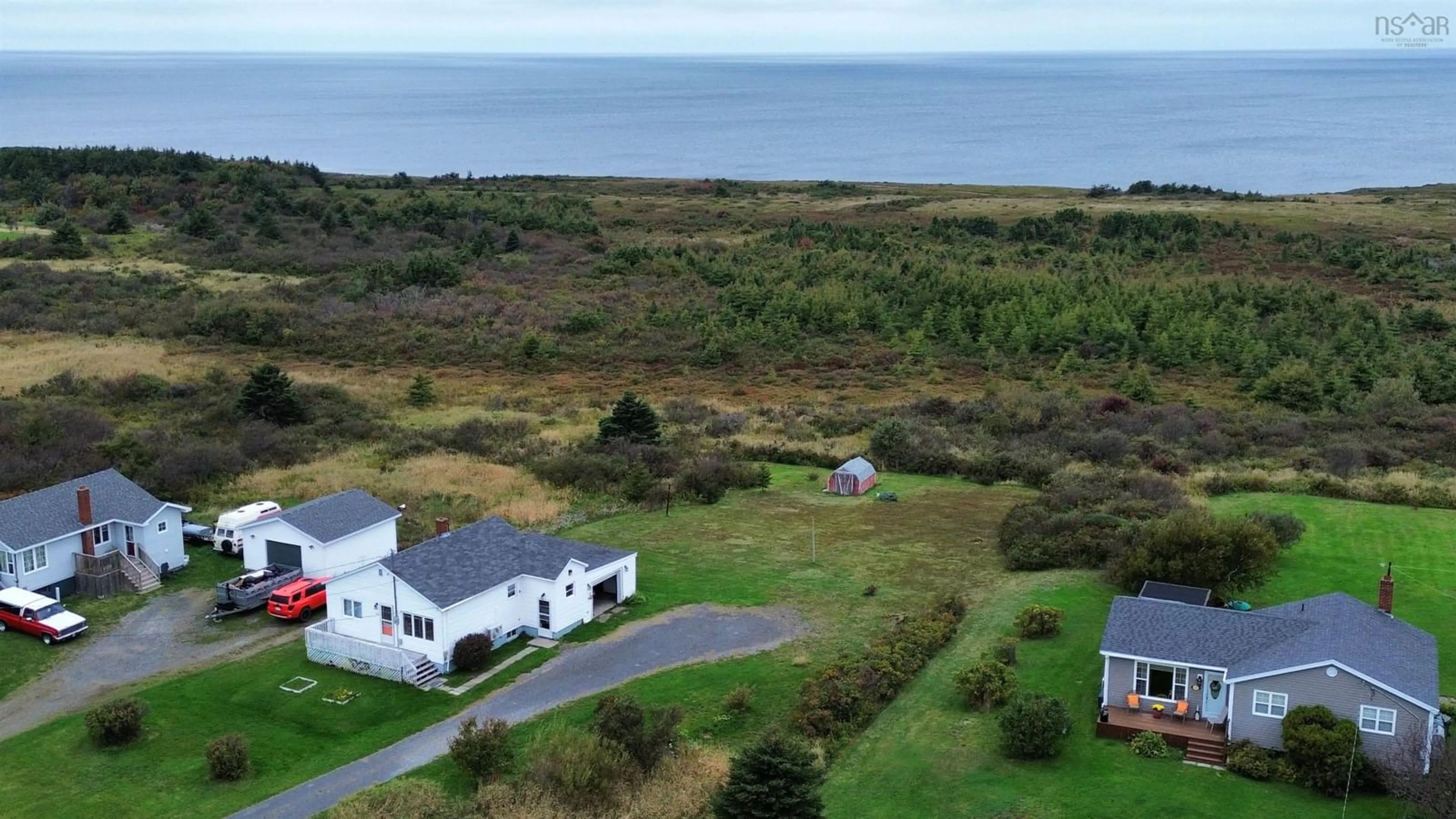 A pic from outside/outdoor area/front of a property/back of a property/a pic from drone, water/lake/river/ocean view for 174 Maclean St, Donkin Nova Scotia B1A 6R3