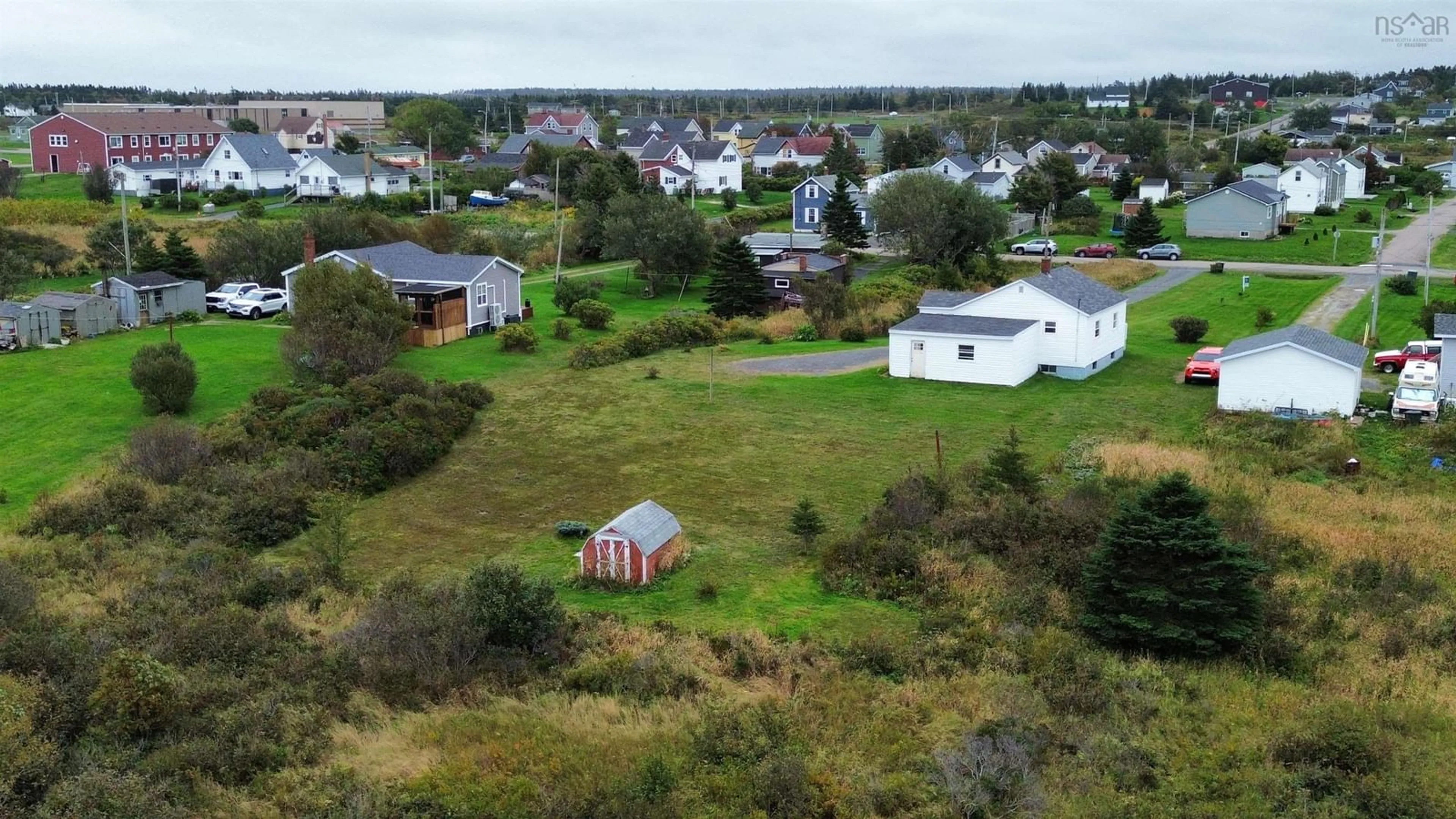 A pic from outside/outdoor area/front of a property/back of a property/a pic from drone, unknown for 174 Maclean St, Donkin Nova Scotia B1A 6R3