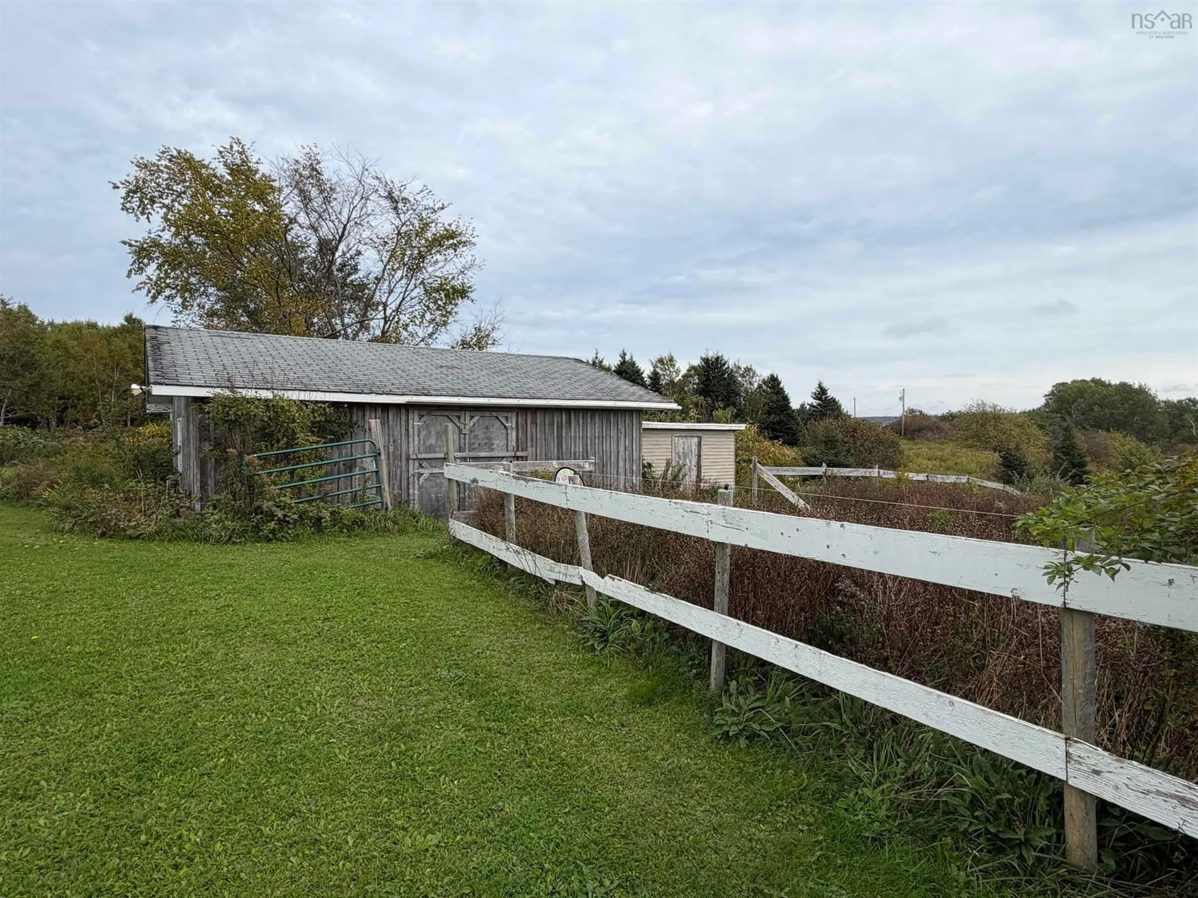 A pic from outside/outdoor area/front of a property/back of a property/a pic from drone, unknown for 687 Coxheath Rd, Sydney Nova Scotia B1L 1B5