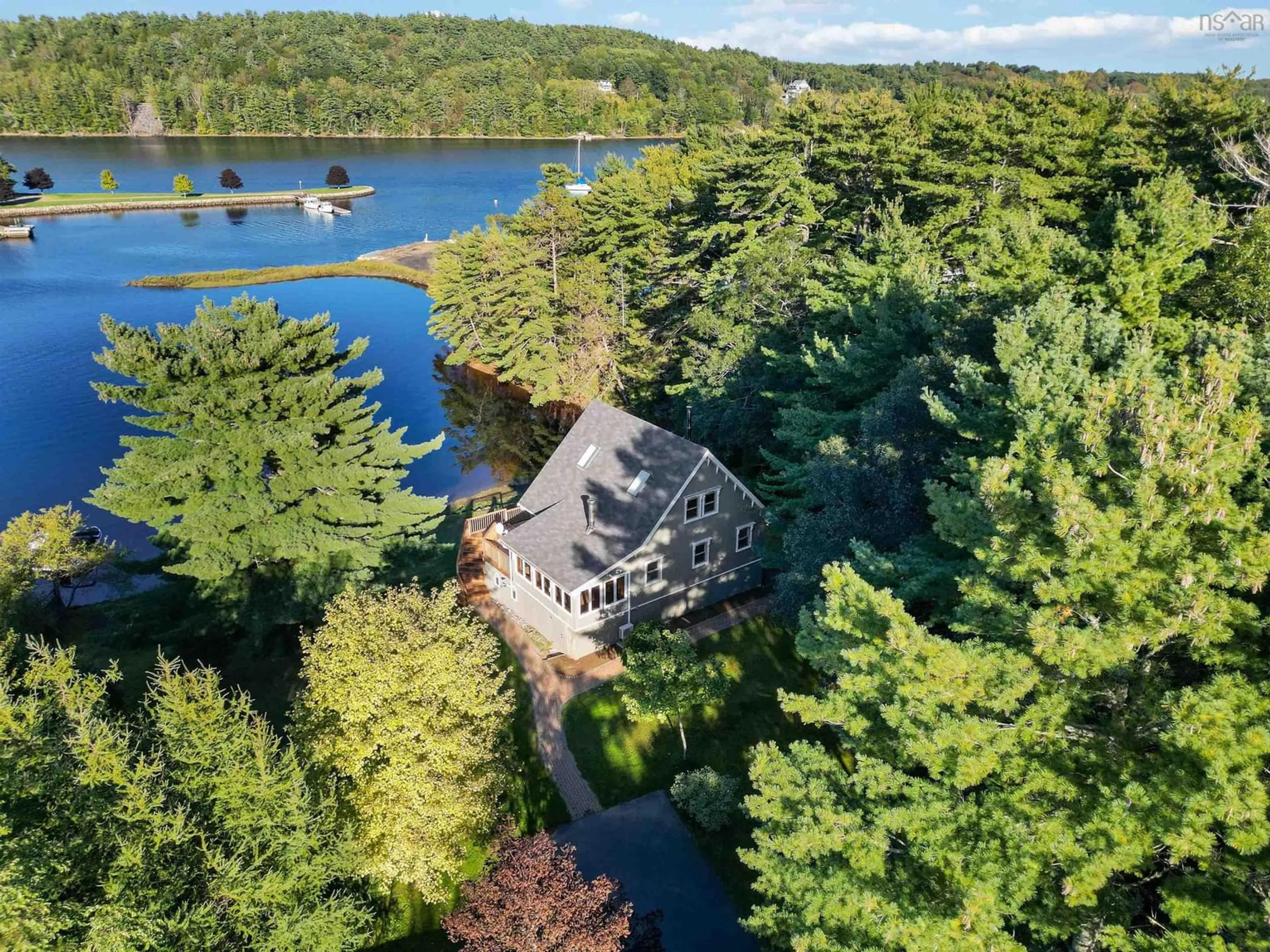 A pic from outside/outdoor area/front of a property/back of a property/a pic from drone, water/lake/river/ocean view for 15 River Lane, Pleasantville Nova Scotia B0R 1G0