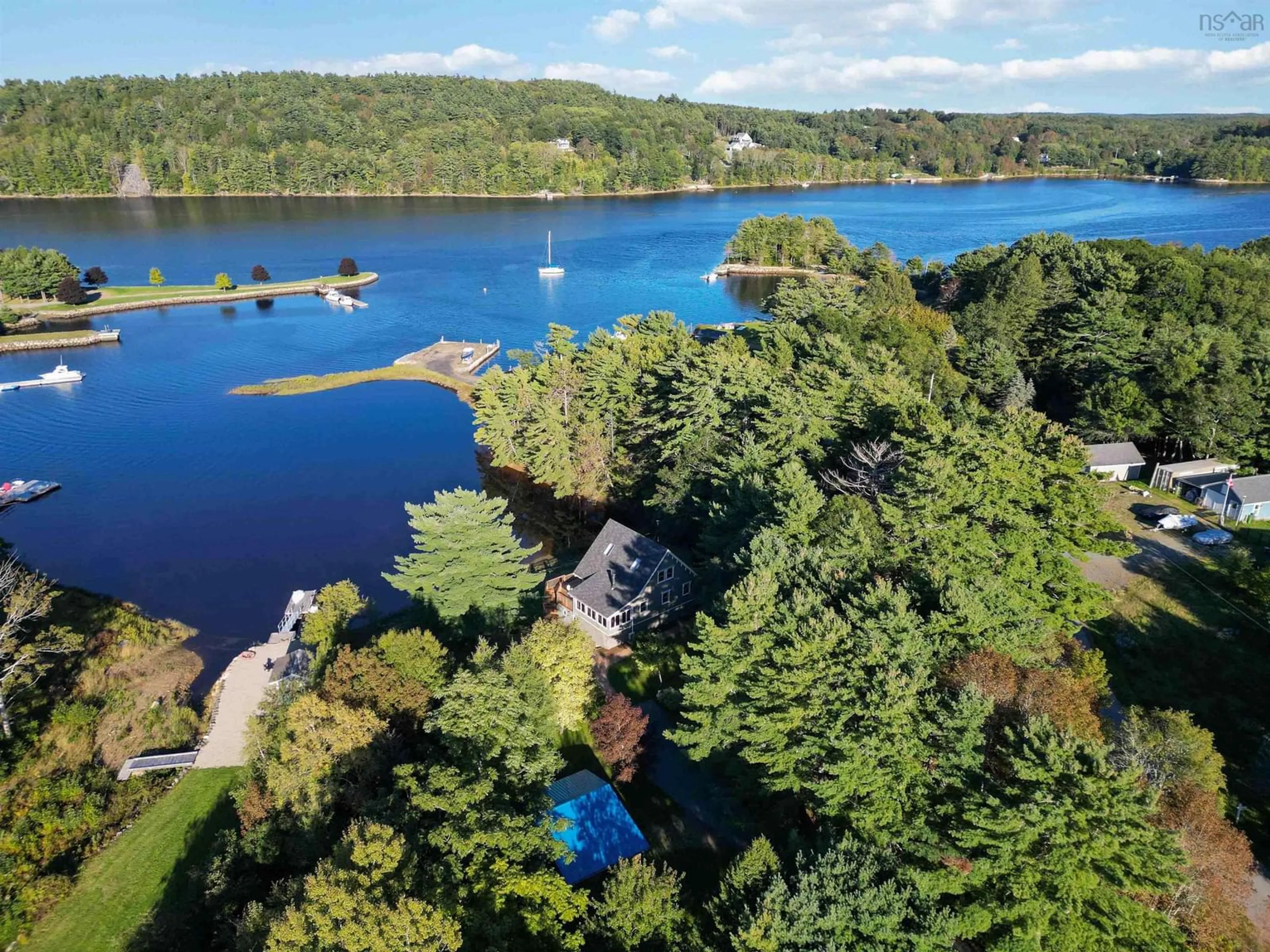 A pic from outside/outdoor area/front of a property/back of a property/a pic from drone, water/lake/river/ocean view for 15 River Lane, Pleasantville Nova Scotia B0R 1G0