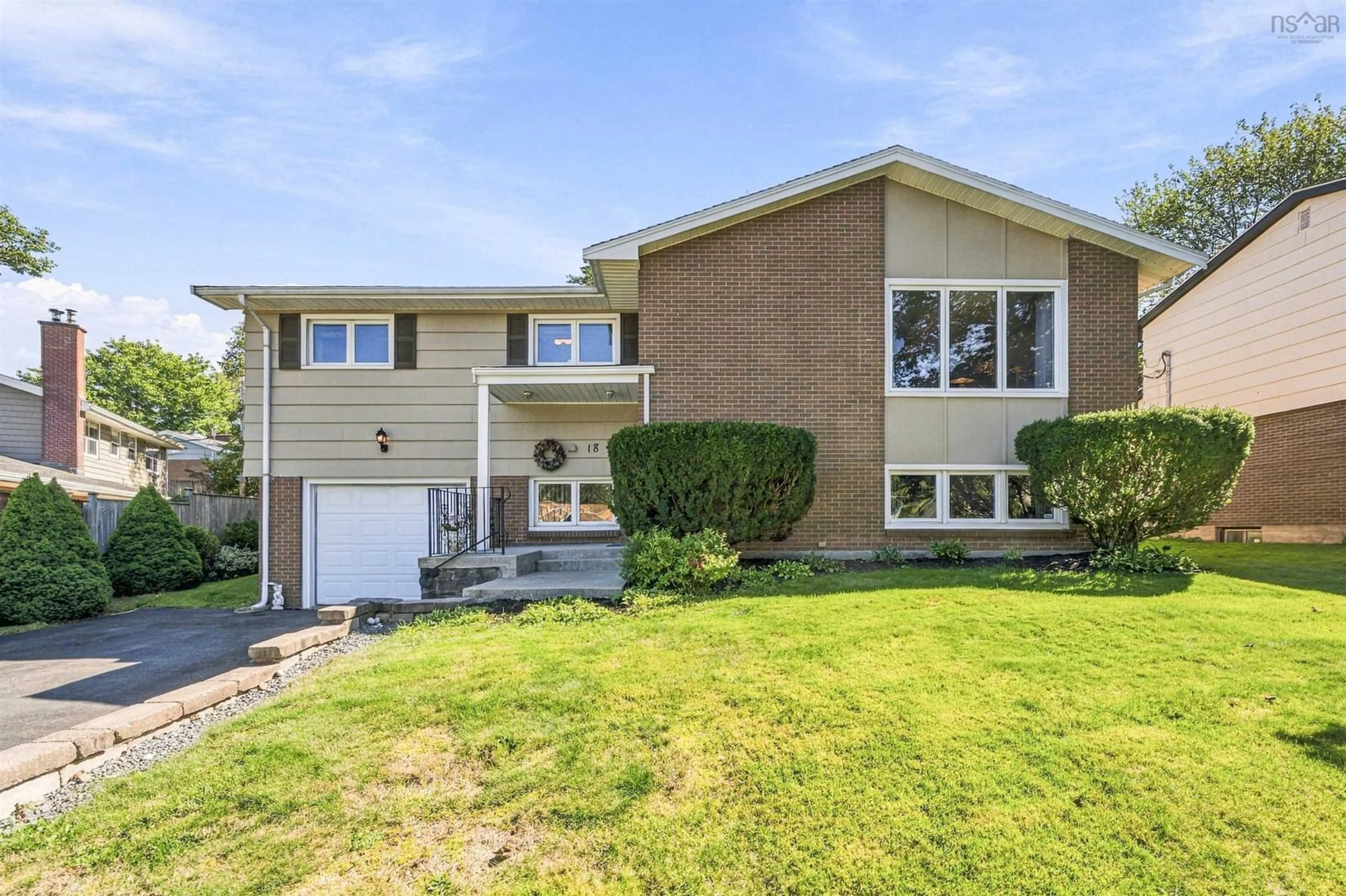 Home with vinyl exterior material, street for 18 Northcliffe Lane, Halifax Nova Scotia B3M 2Z6