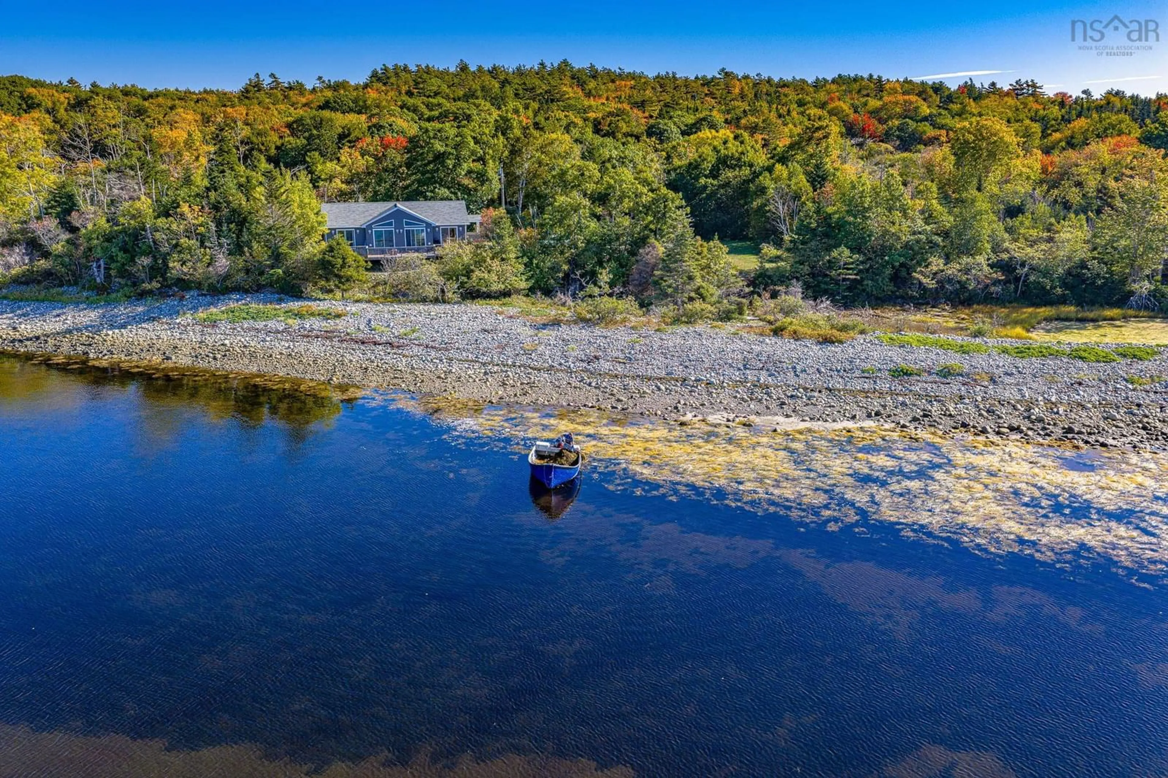 A pic from outside/outdoor area/front of a property/back of a property/a pic from drone, water/lake/river/ocean view for 5763 Highway 3, East Jordan Nova Scotia B0T 1J0