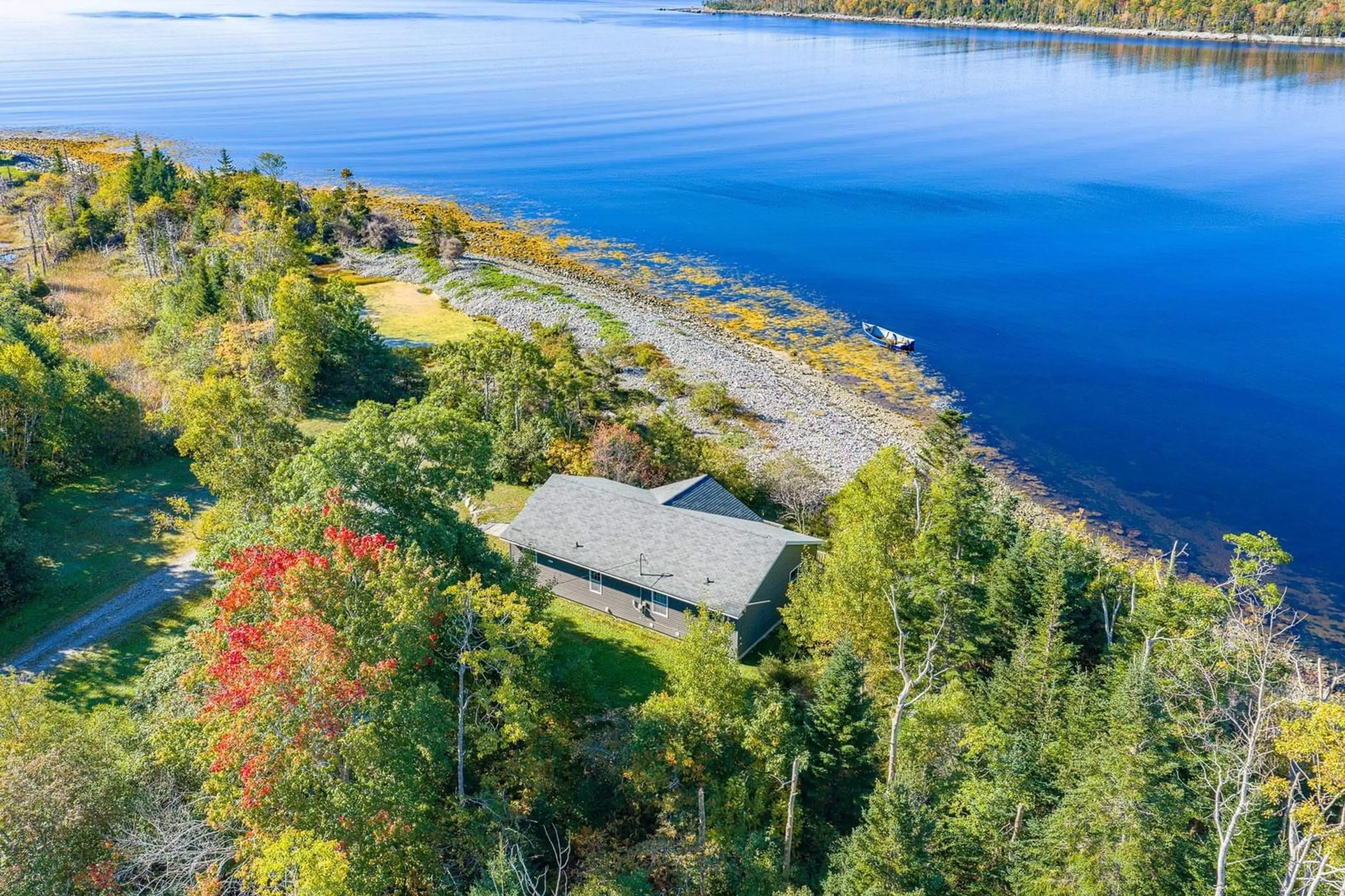 A pic from outside/outdoor area/front of a property/back of a property/a pic from drone, water/lake/river/ocean view for 5763 Highway 3, East Jordan Nova Scotia B0T 1J0