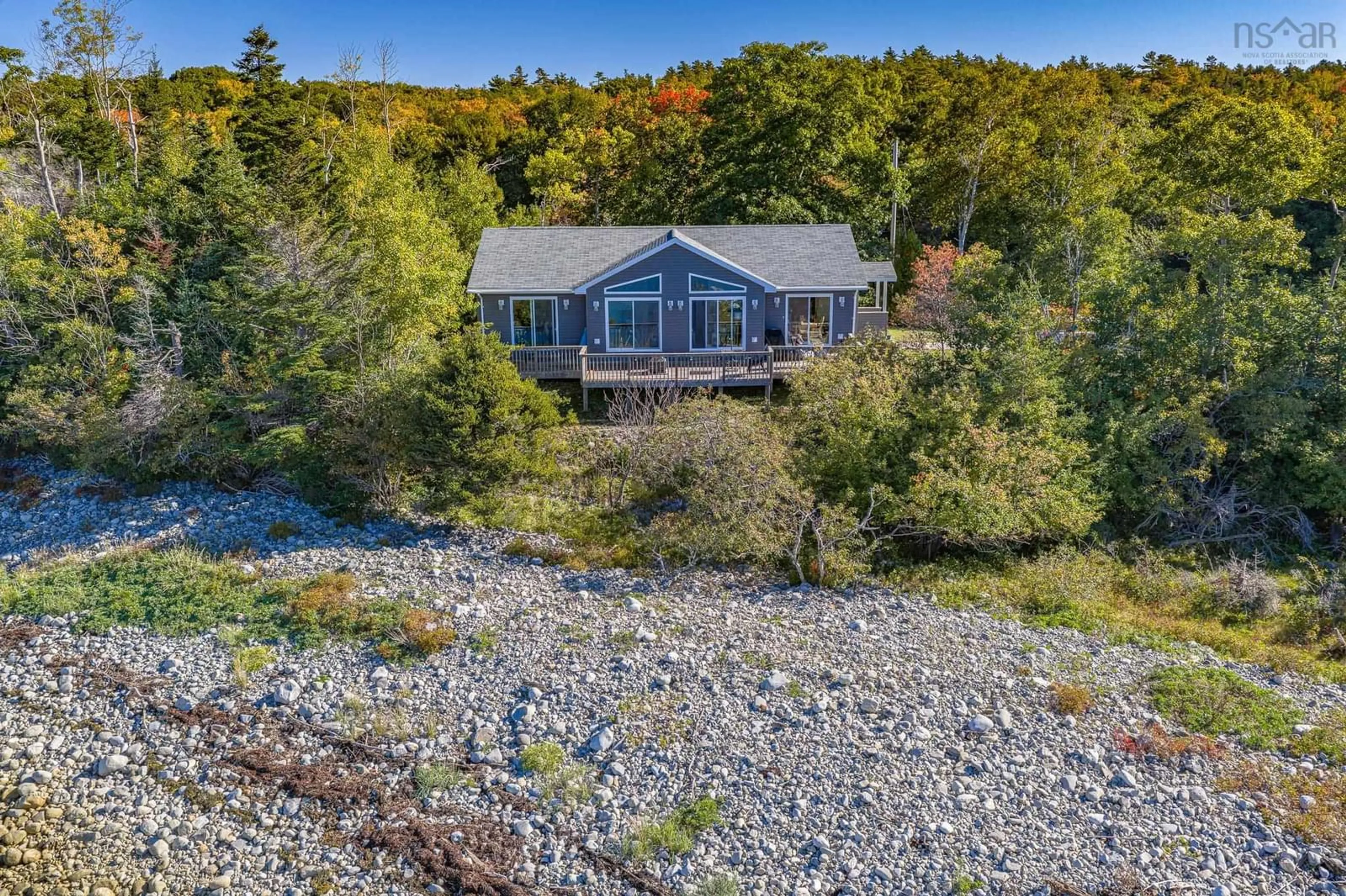 A pic from outside/outdoor area/front of a property/back of a property/a pic from drone, water/lake/river/ocean view for 5763 Highway 3, East Jordan Nova Scotia B0T 1J0