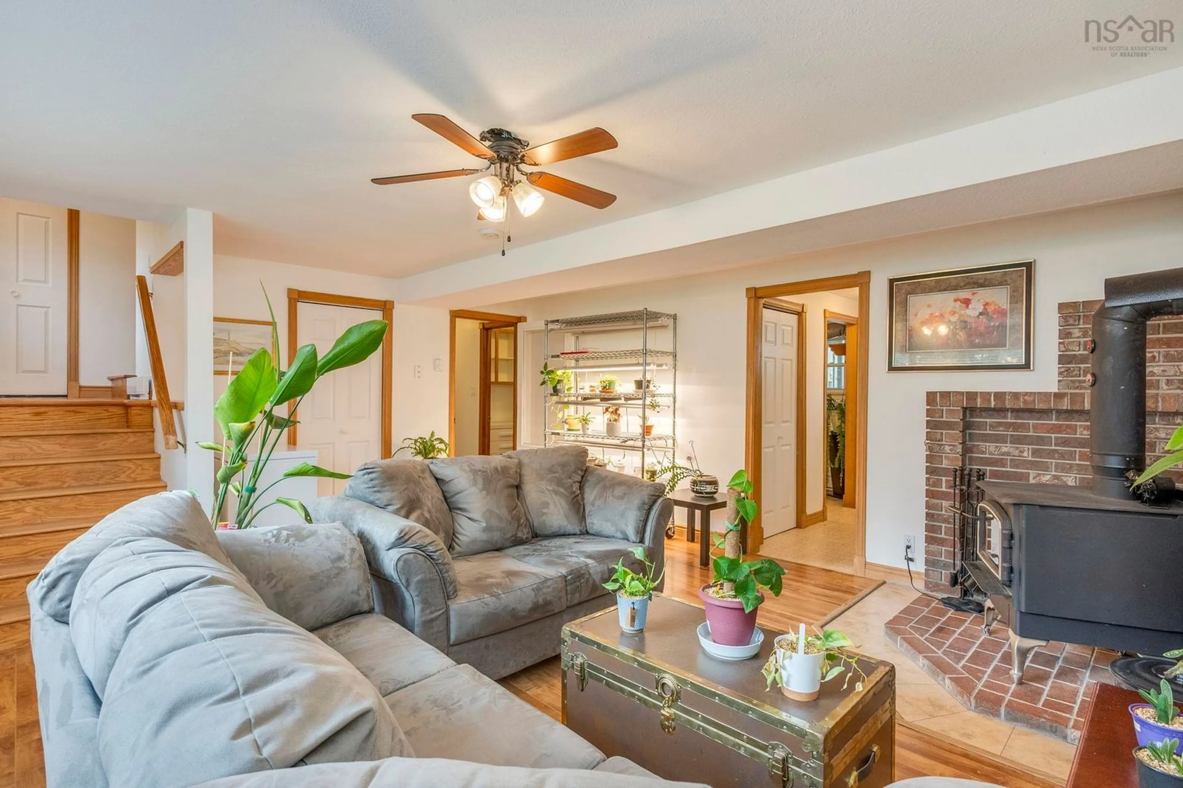 Living room with furniture, wood/laminate floor for 9147 201 Hwy, Nictaux Nova Scotia B0S 1P0