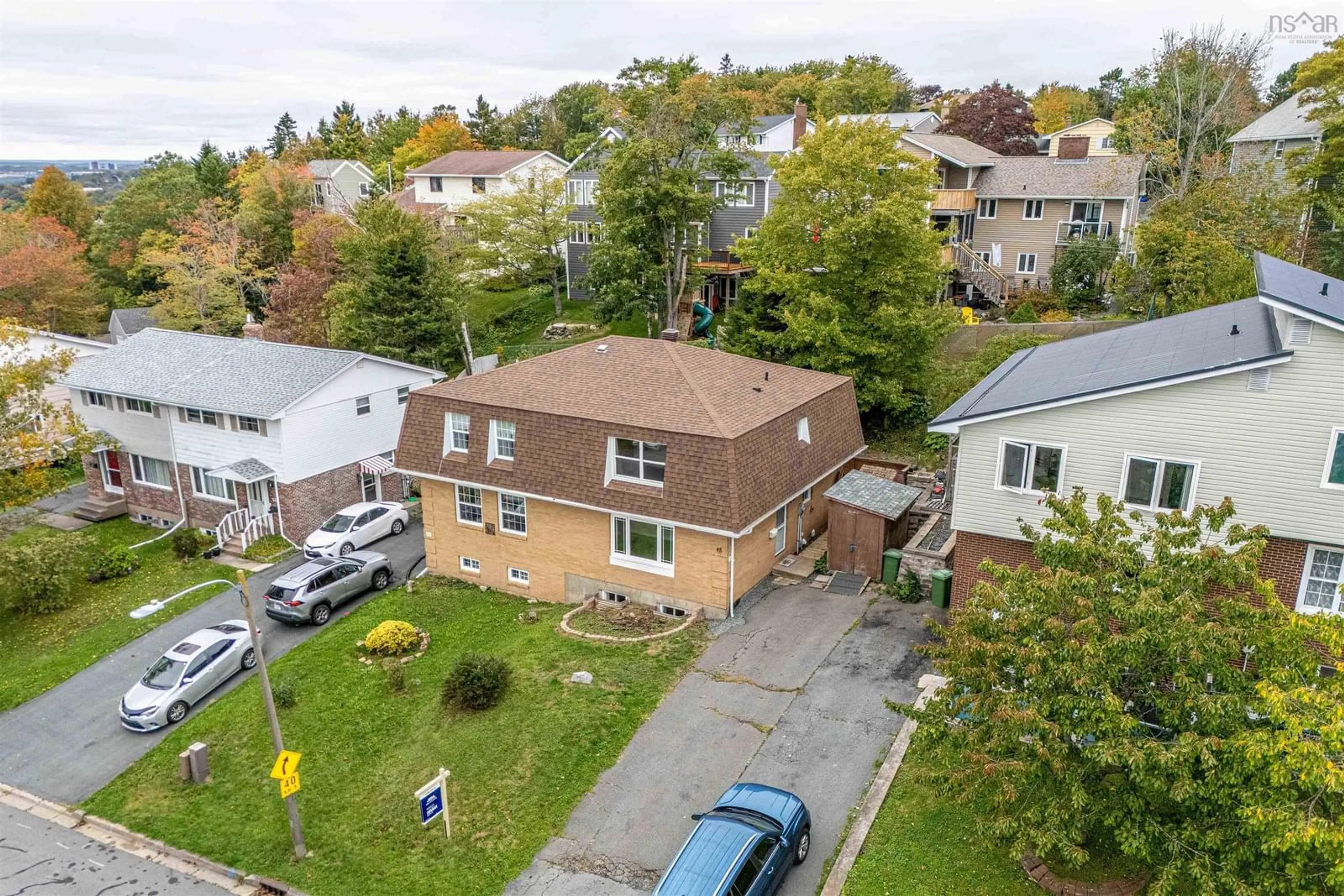 A pic from outside/outdoor area/front of a property/back of a property/a pic from drone, street for 48 Regal Rd, Dartmouth Nova Scotia B2W 4H6