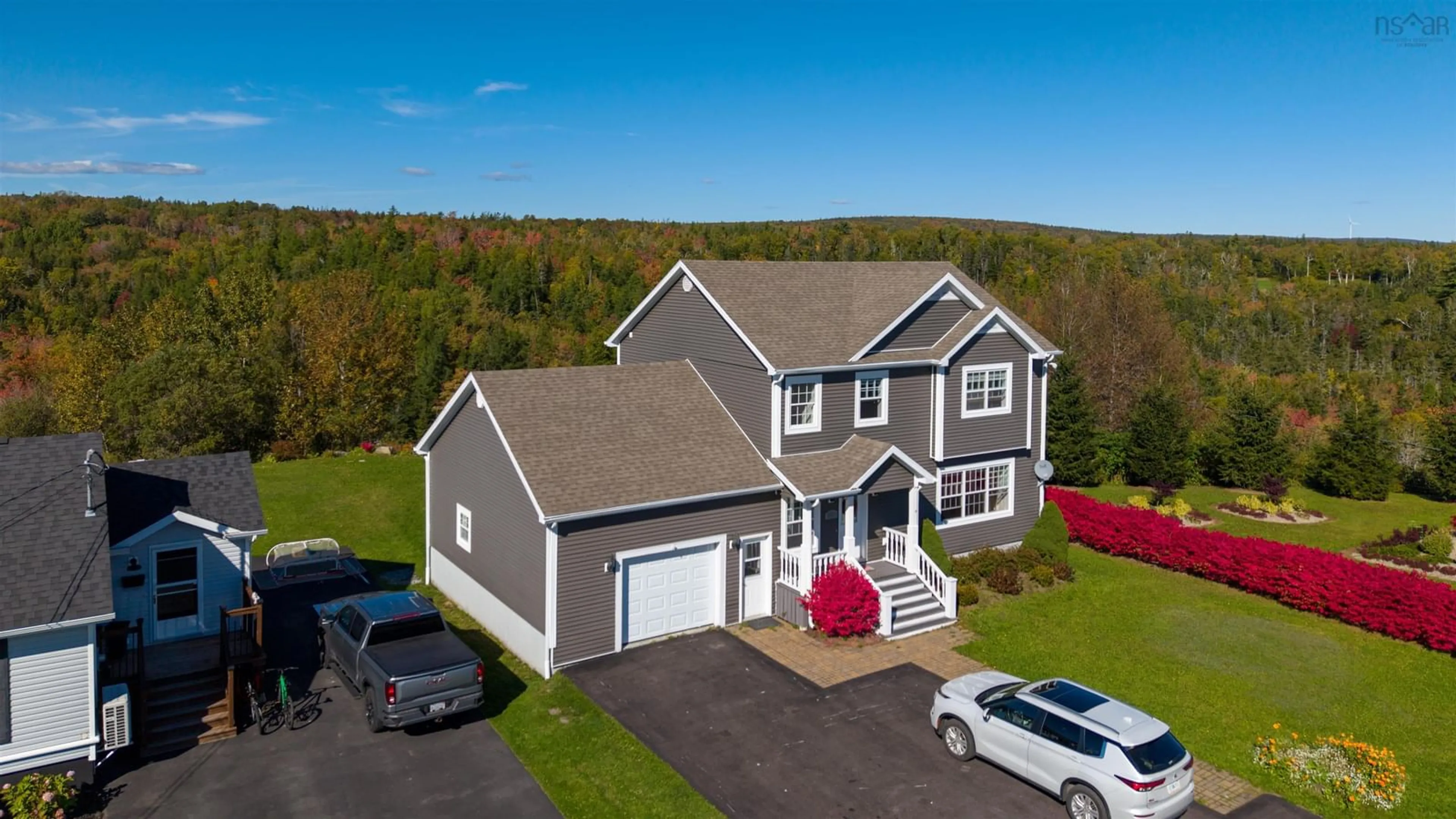 A pic from outside/outdoor area/front of a property/back of a property/a pic from drone, unknown for 20 Alexander Dr, Baddeck Nova Scotia B0E 1B0