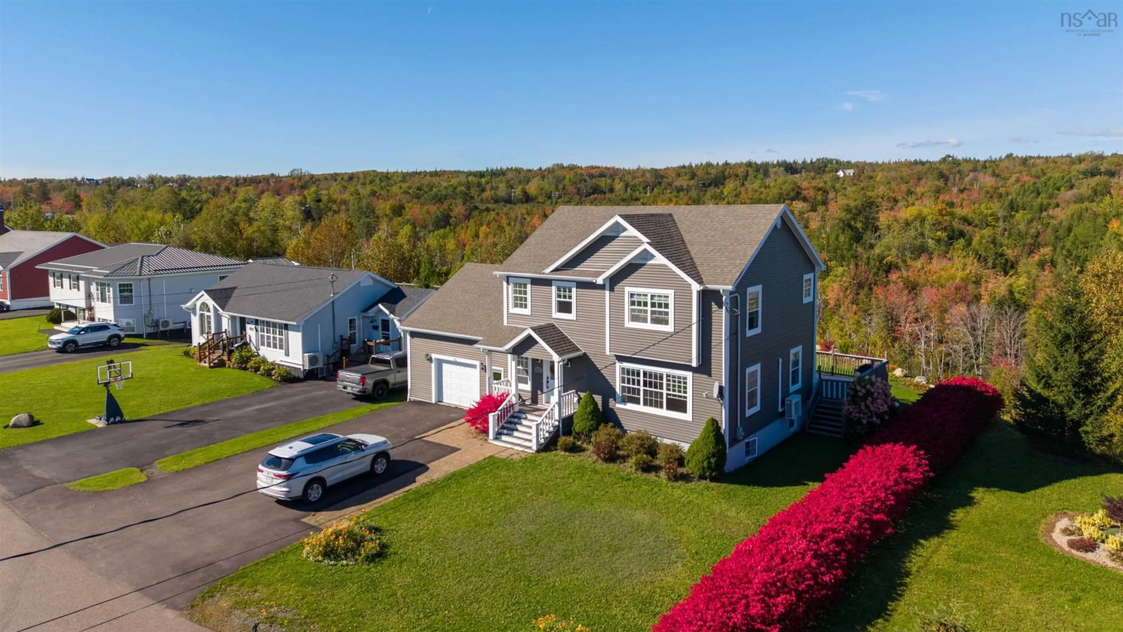 A pic from outside/outdoor area/front of a property/back of a property/a pic from drone, water/lake/river/ocean view for 20 Alexander Dr, Baddeck Nova Scotia B0E 1B0