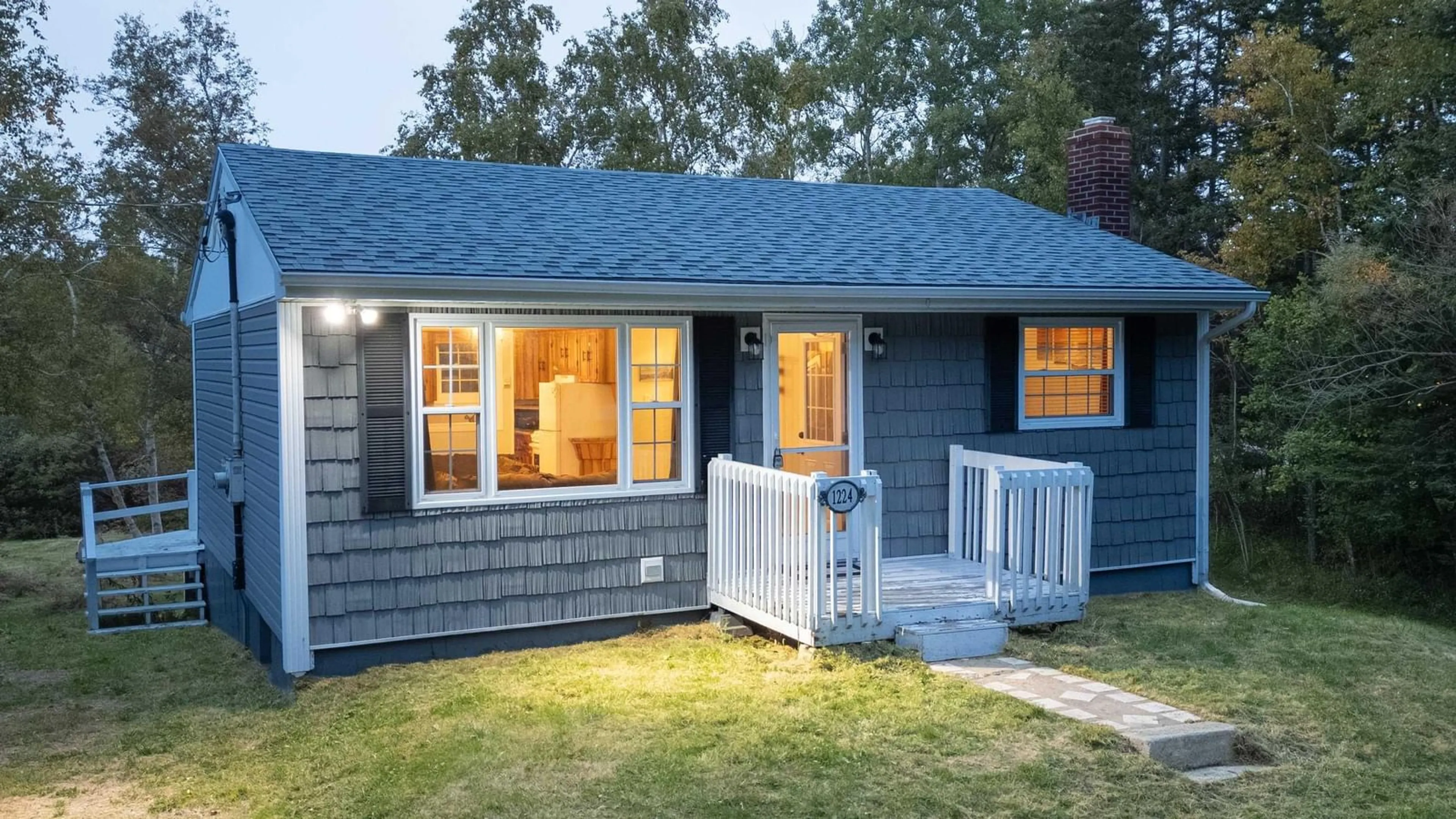 Home with vinyl exterior material, street for 1224 Georges River Rd Rd, Georges River Nova Scotia B1Y 3H2