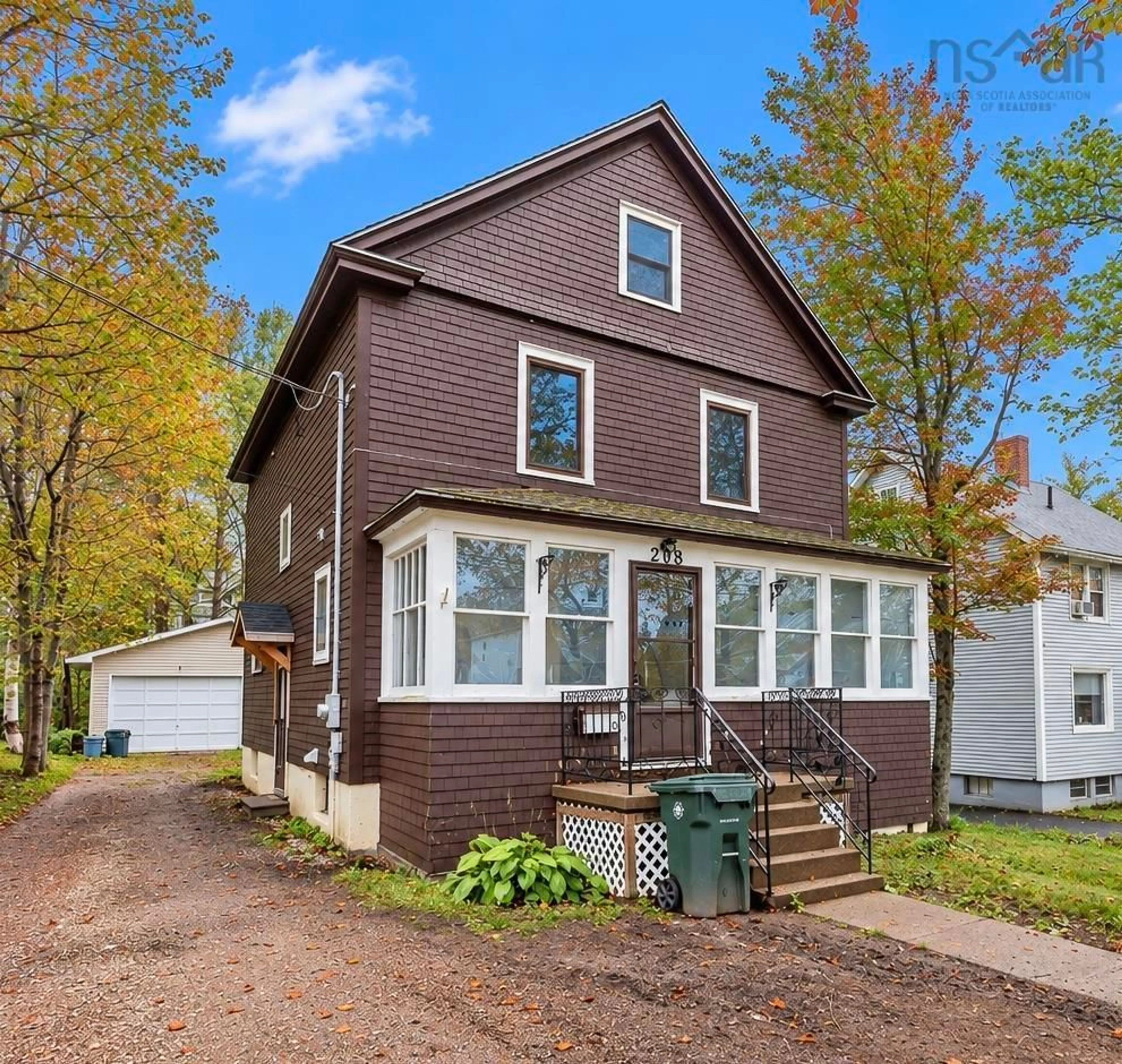 Home with vinyl exterior material, street for 208 Whitney Ave, Sydney Nova Scotia B1P 5A4