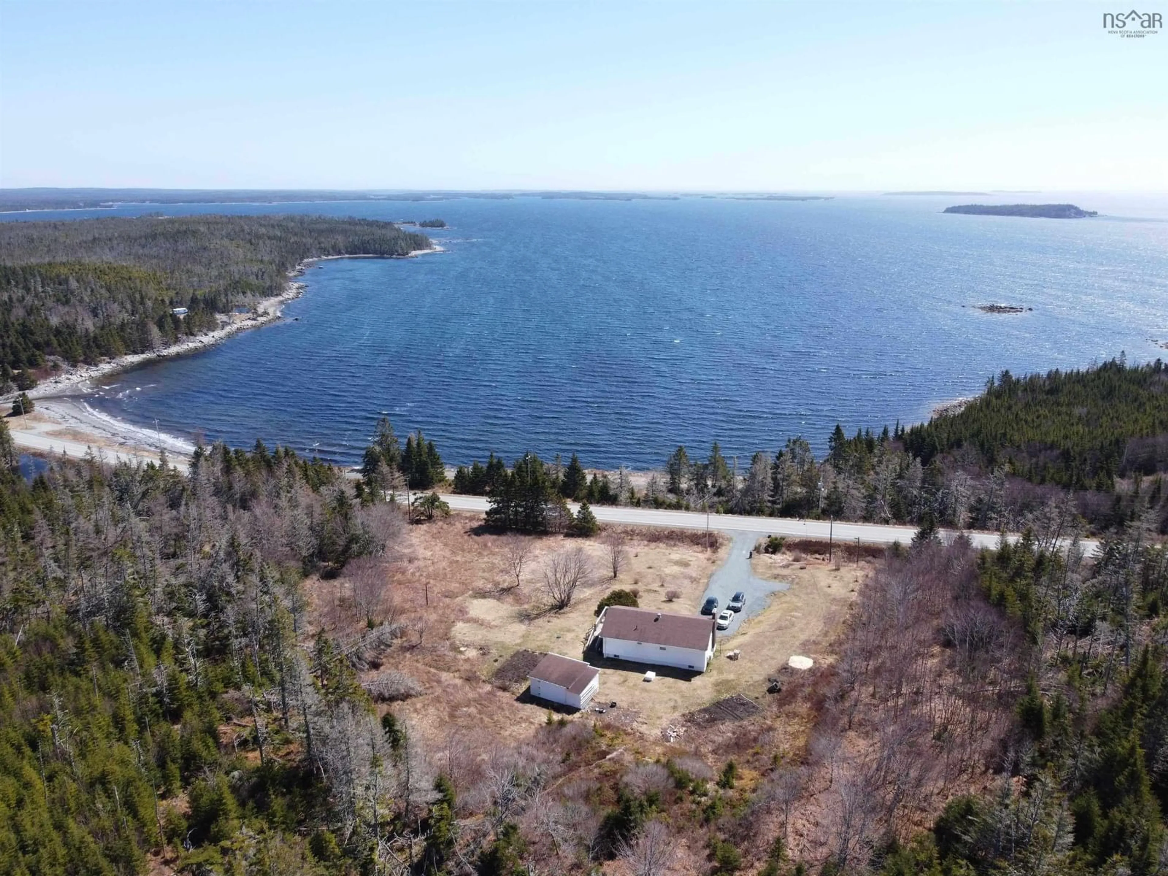 A pic from outside/outdoor area/front of a property/back of a property/a pic from drone, water/lake/river/ocean view for 28019 Highway 7, Moosehead Nova Scotia B0J 2K0