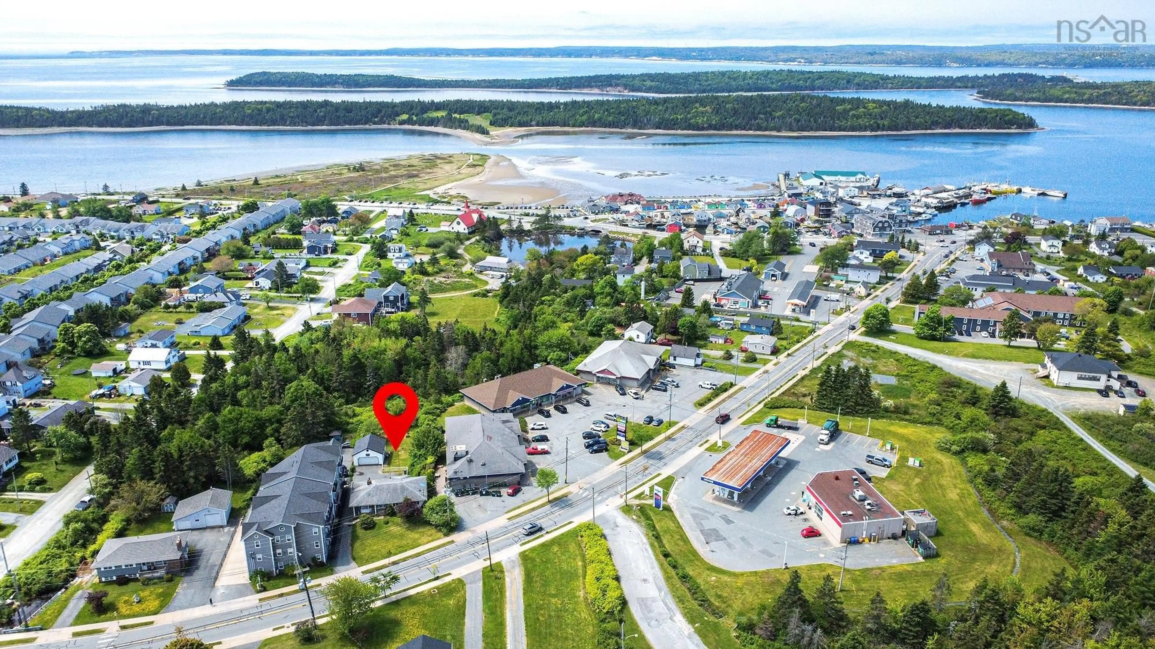 A pic from outside/outdoor area/front of a property/back of a property/a pic from drone, water/lake/river/ocean view for 87 Cow Bay Rd, Eastern Passage Nova Scotia B3G 1A3