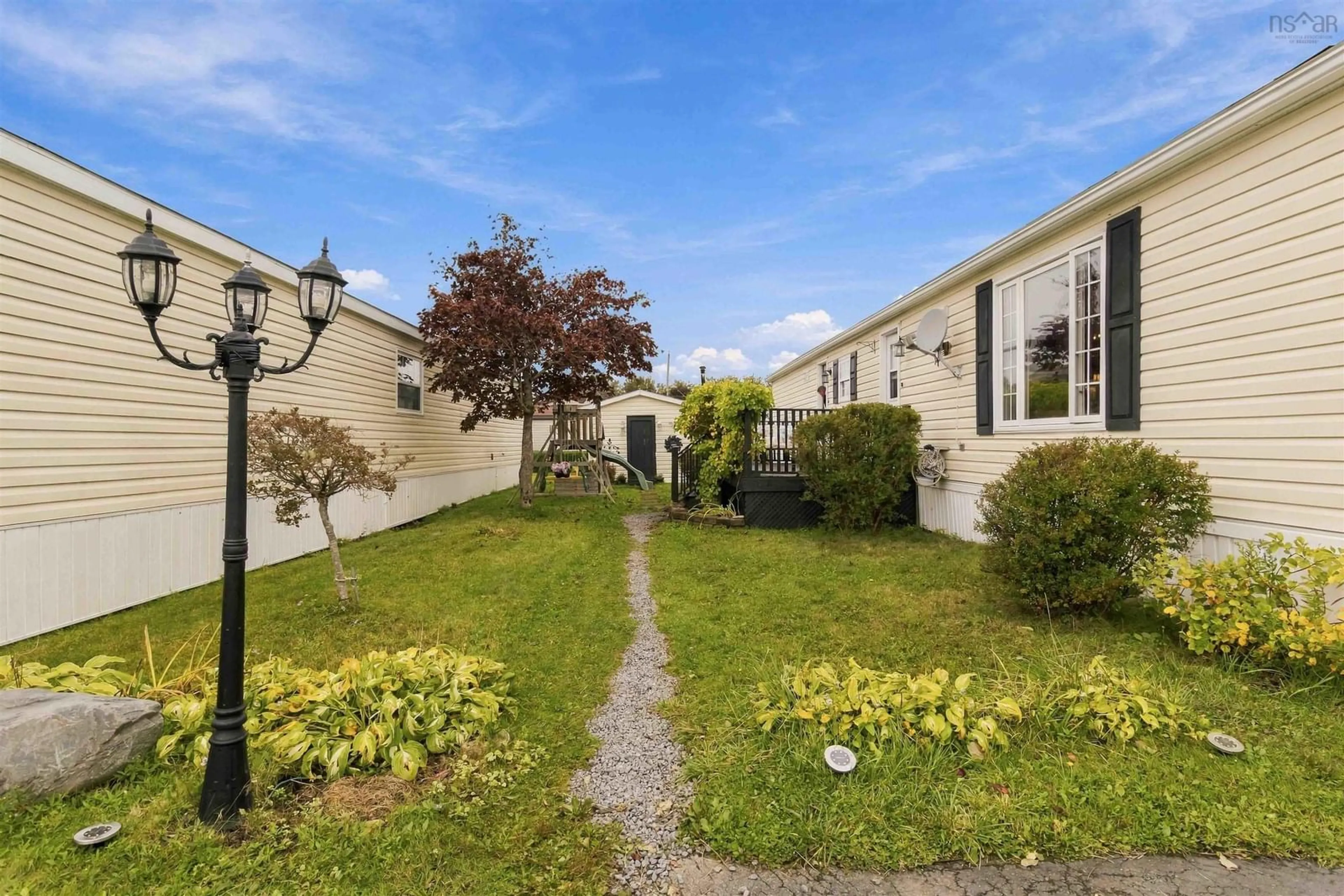 A pic from outside/outdoor area/front of a property/back of a property/a pic from drone, street for 18 Birchill Dr, Eastern Passage Nova Scotia B3G 1C8