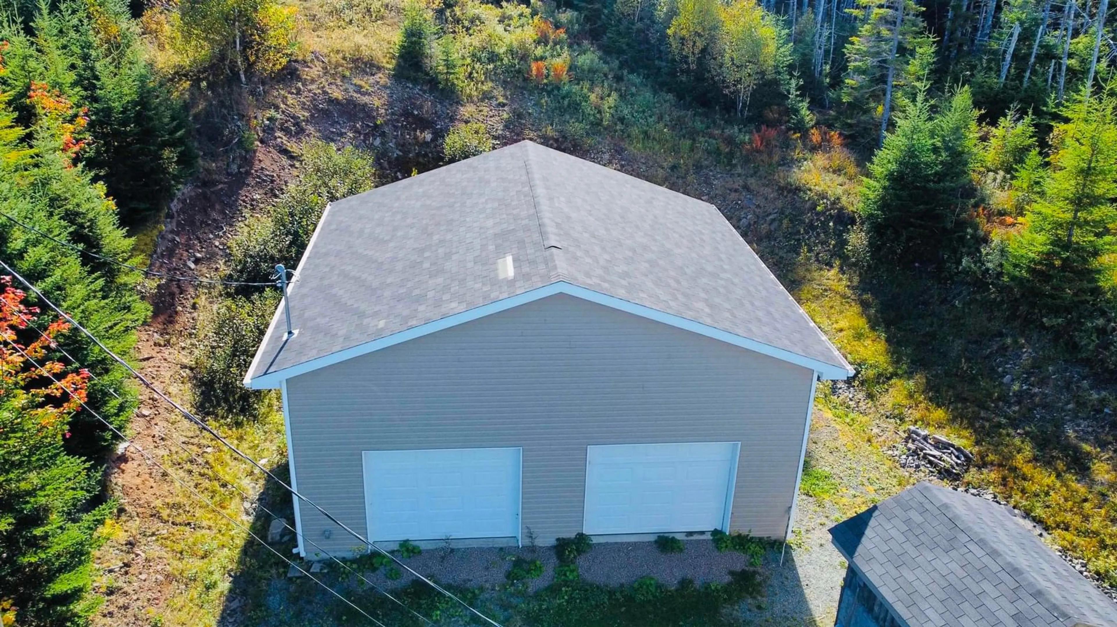 A pic from outside/outdoor area/front of a property/back of a property/a pic from drone, building for 10198 Grenville St, St. Peter's Nova Scotia B0E 3B0
