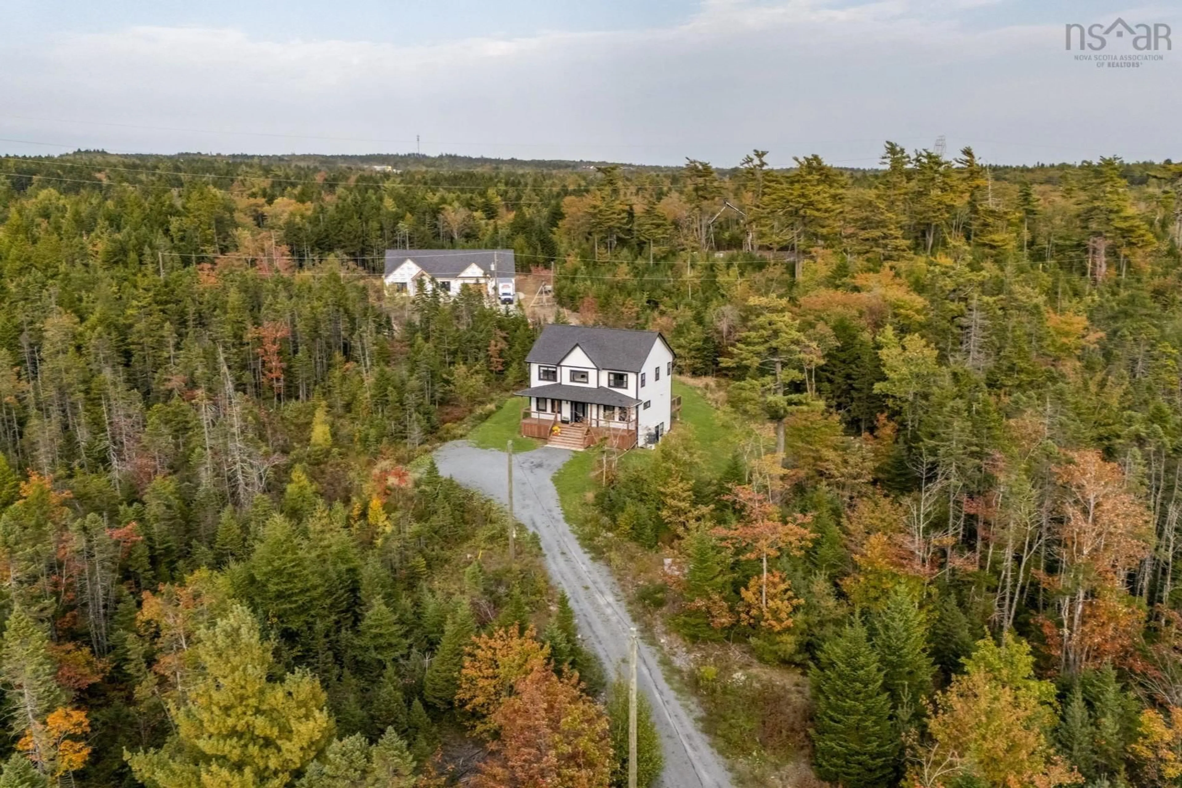 A pic from outside/outdoor area/front of a property/back of a property/a pic from drone, forest/trees view for 511 Midnight Run, Middle Sackville Nova Scotia B4E 0R3