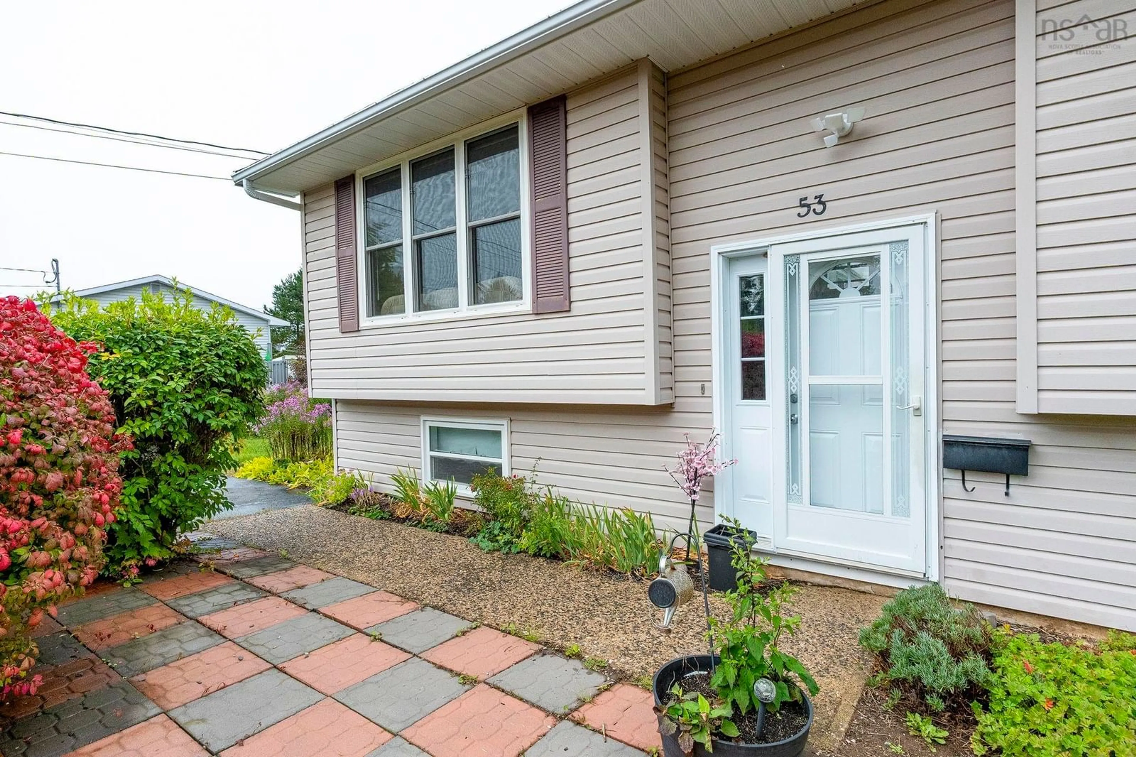 Home with vinyl exterior material, street for 53 Old Farm Lane, New Minas Nova Scotia B4N 4M5