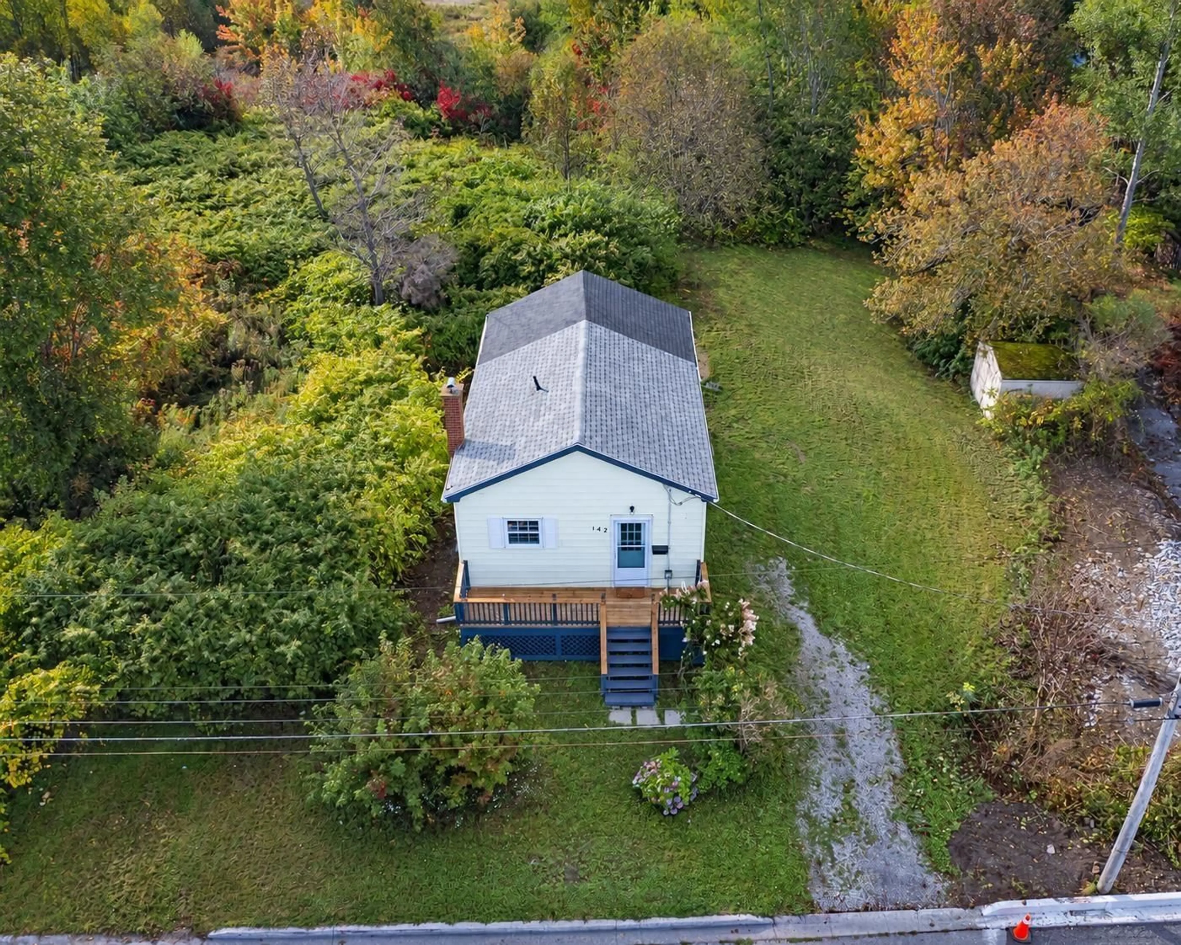 A pic from outside/outdoor area/front of a property/back of a property/a pic from drone, unknown for 142 Maloney St, Sydney Nova Scotia B1N 2C8