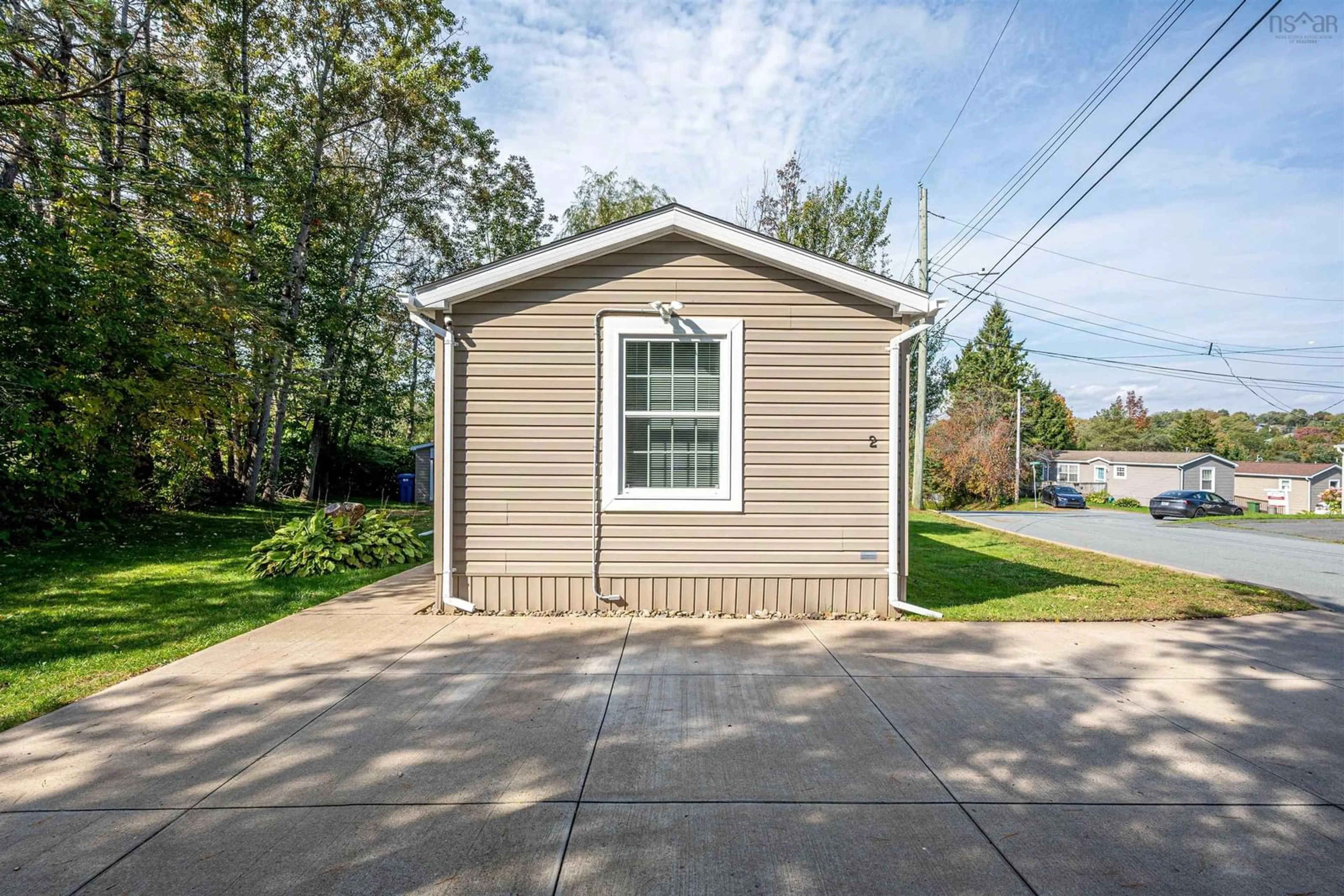 Home with vinyl exterior material, street for 2 Alan St, Middle Sackville Nova Scotia B4E 1C8