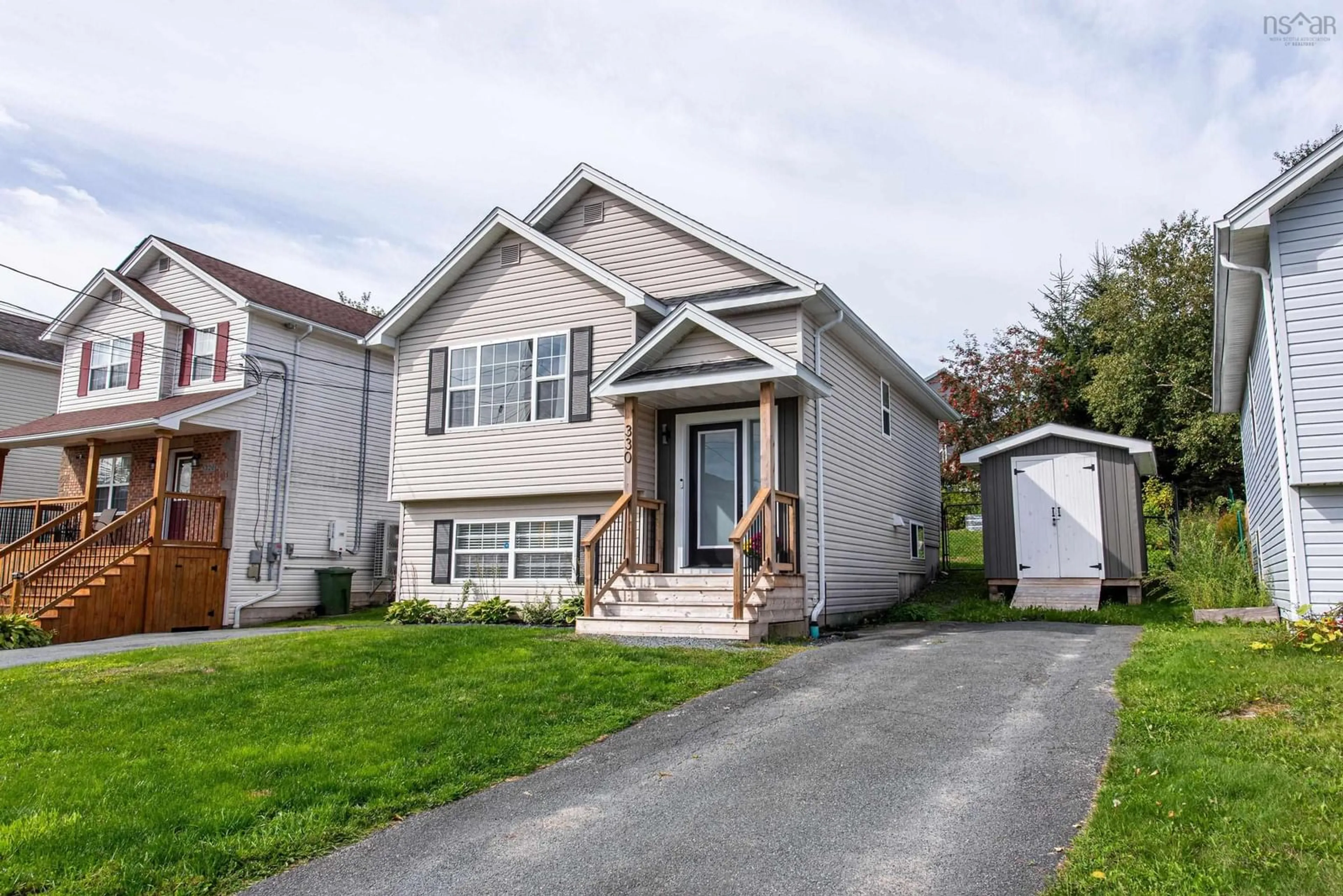 Home with vinyl exterior material, street for 330 Charles Rd, Timberlea Nova Scotia B3T 1N7