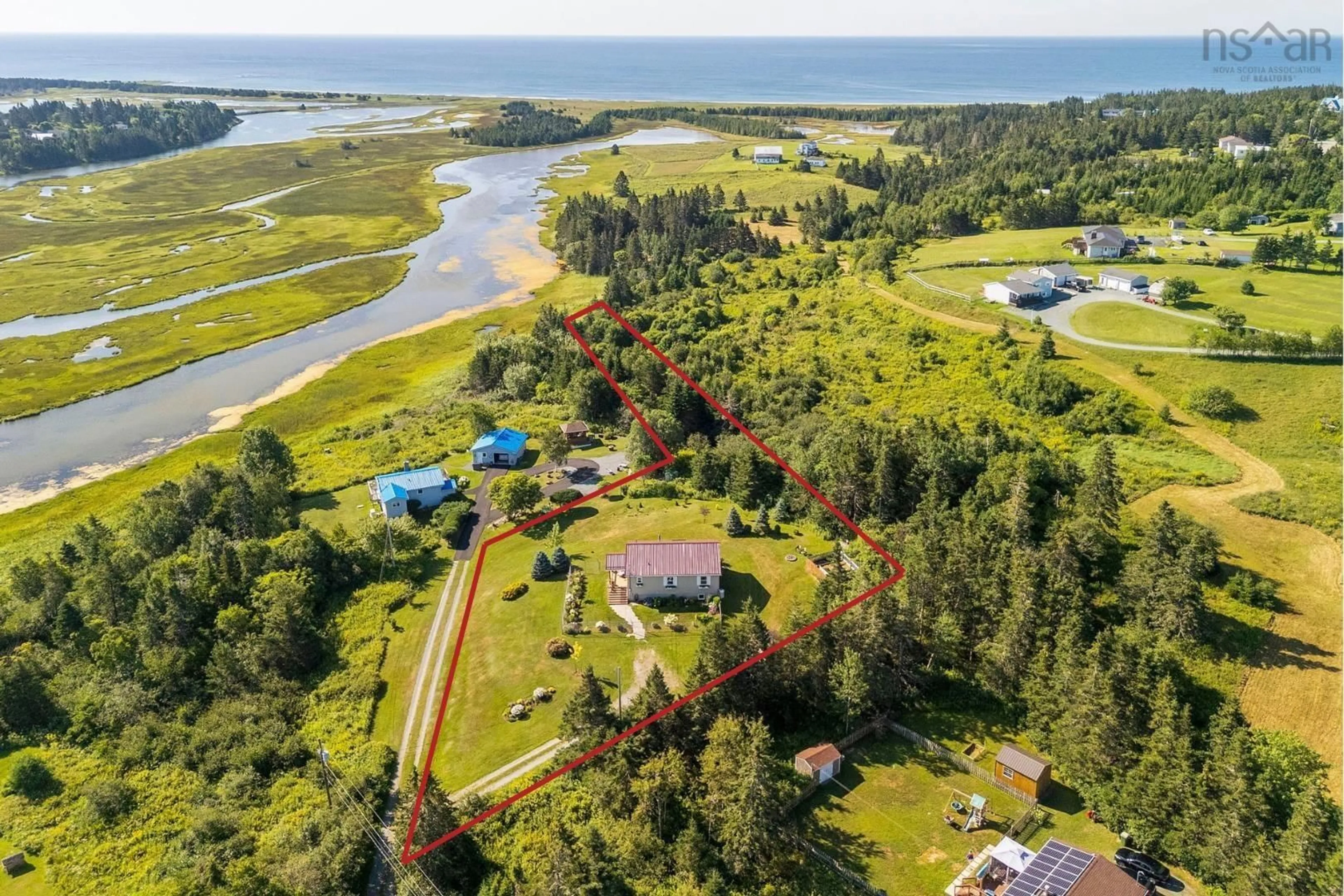 A pic from outside/outdoor area/front of a property/back of a property/a pic from drone, water/lake/river/ocean view for 21 Nancy Lane, Lawrencetown Nova Scotia B2Z 0A1