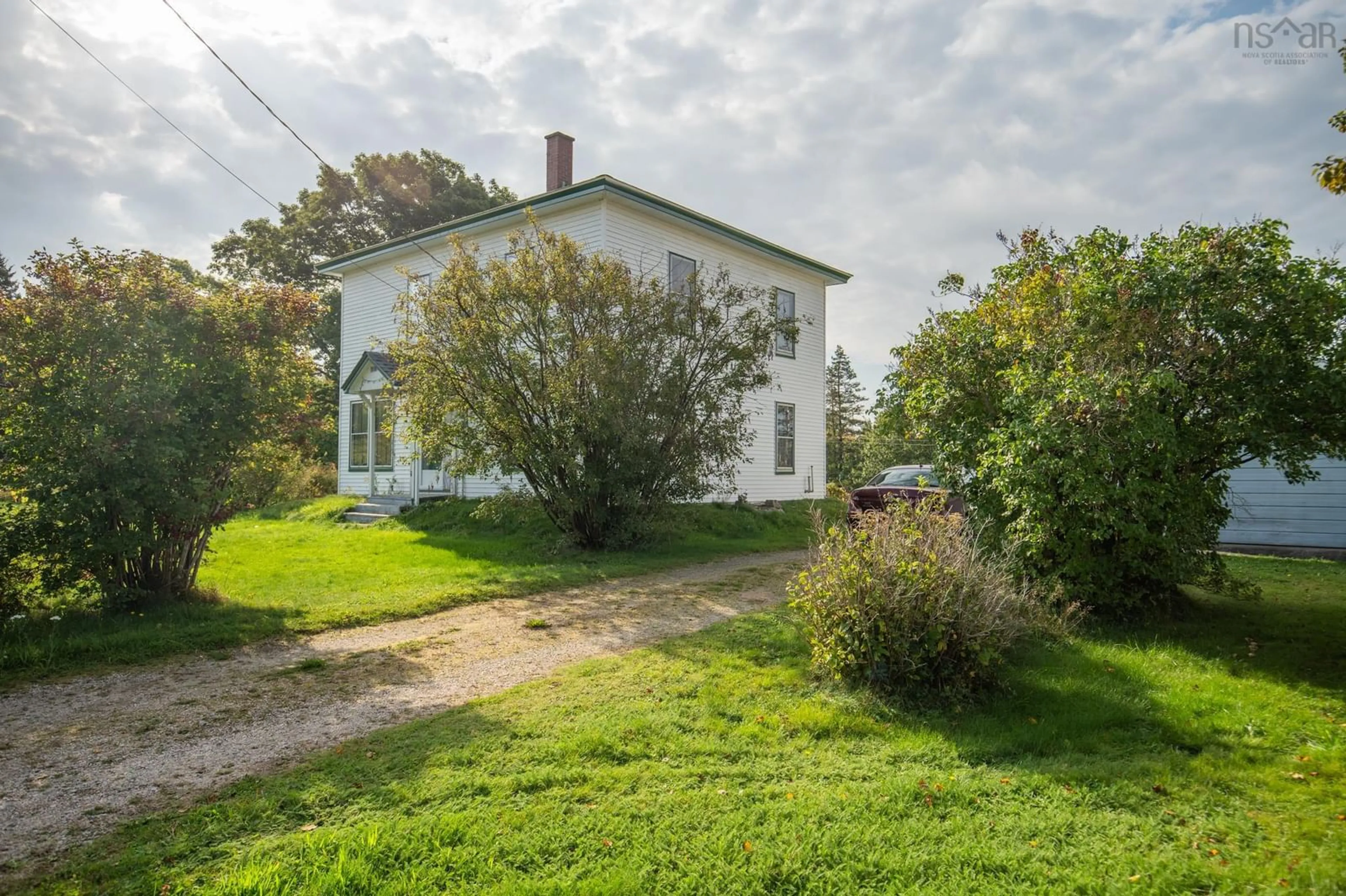 A pic from outside/outdoor area/front of a property/back of a property/a pic from drone, building for 212 Highway 203, Carleton Nova Scotia B5A 5R2