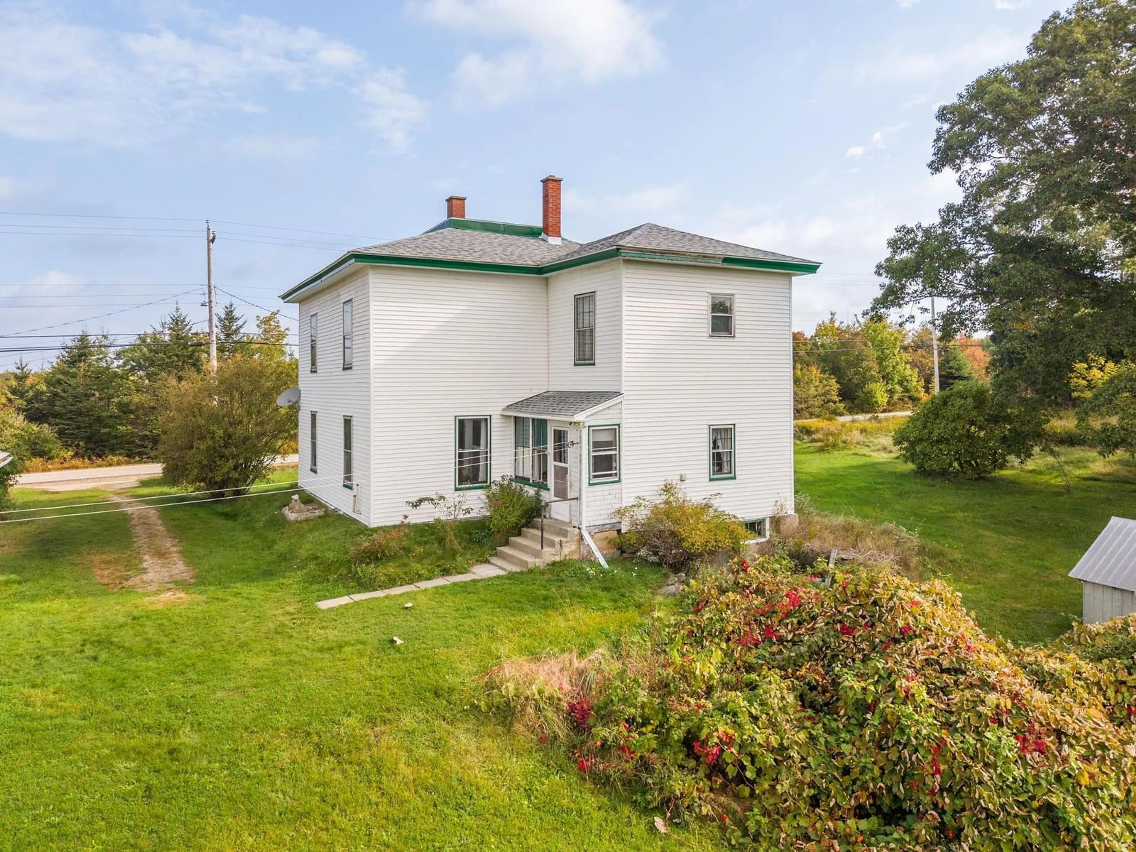 A pic from outside/outdoor area/front of a property/back of a property/a pic from drone, building for 212 Highway 203, Carleton Nova Scotia B5A 5R2
