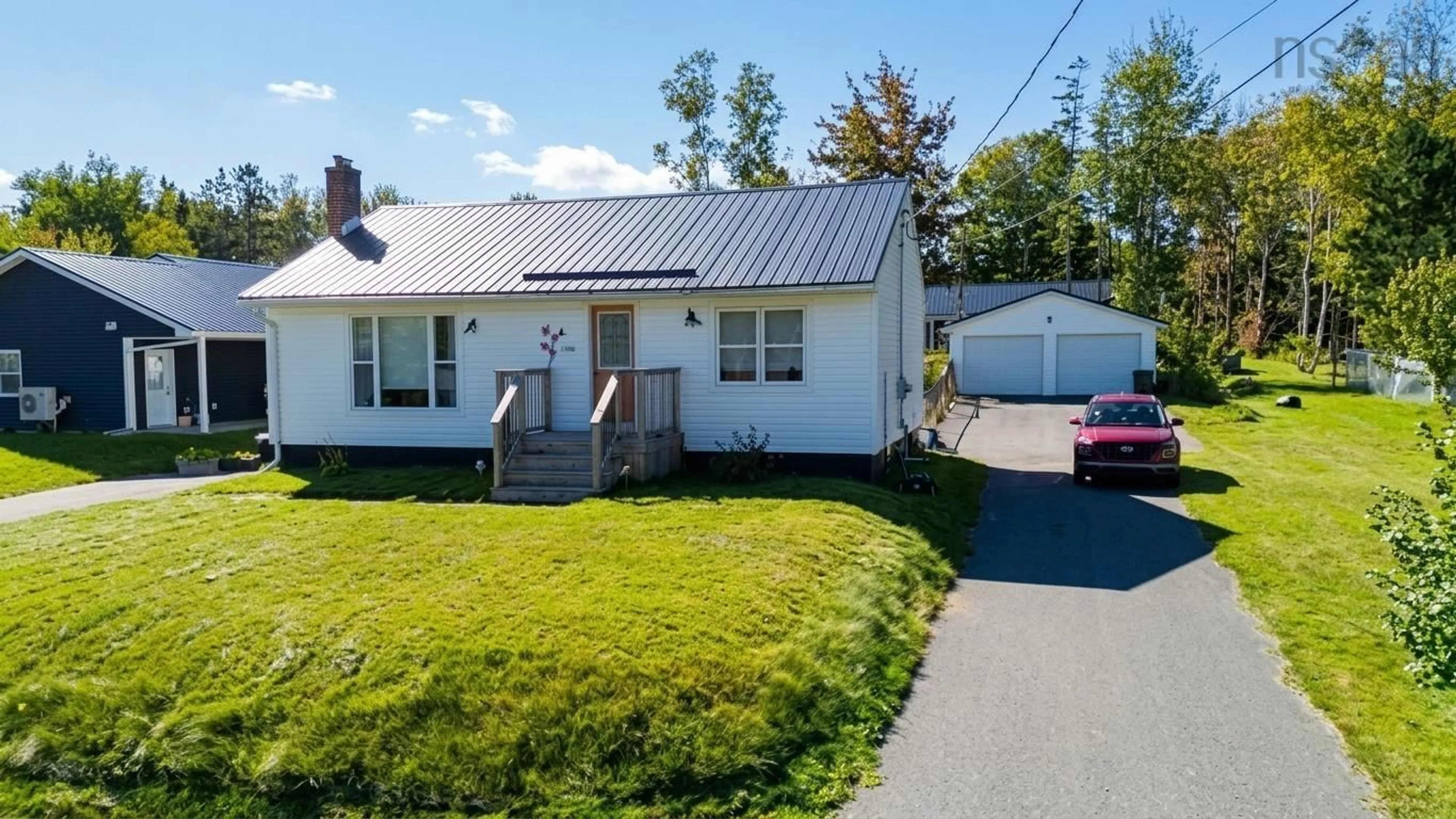 A pic from outside/outdoor area/front of a property/back of a property/a pic from drone, street for 158 Woodlawn Dr, Sydney River Nova Scotia B1S 1H9