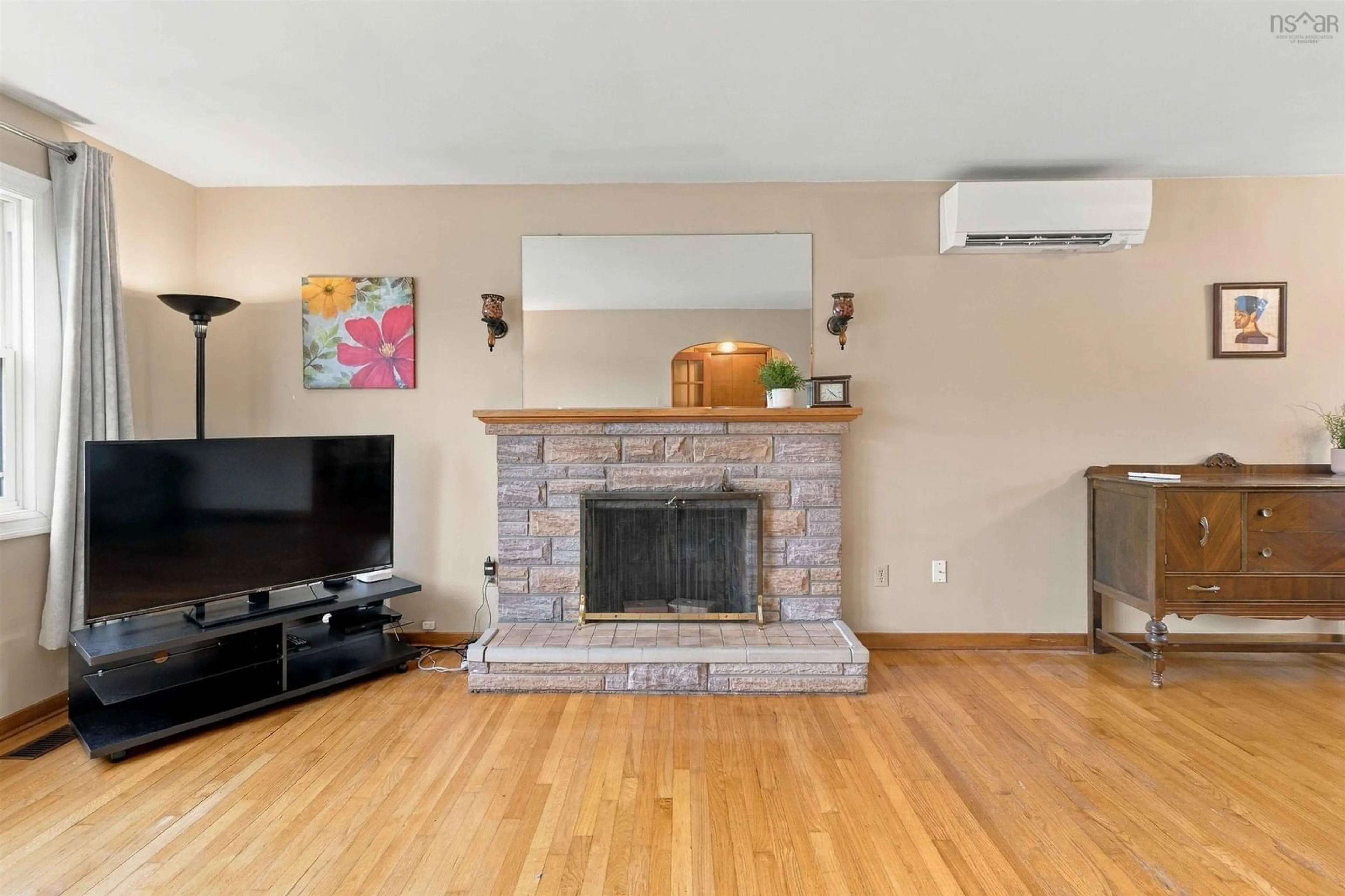 Living room with furniture, wood/laminate floor for 32 Mount Edward Rd, Dartmouth Nova Scotia B2W 3K4