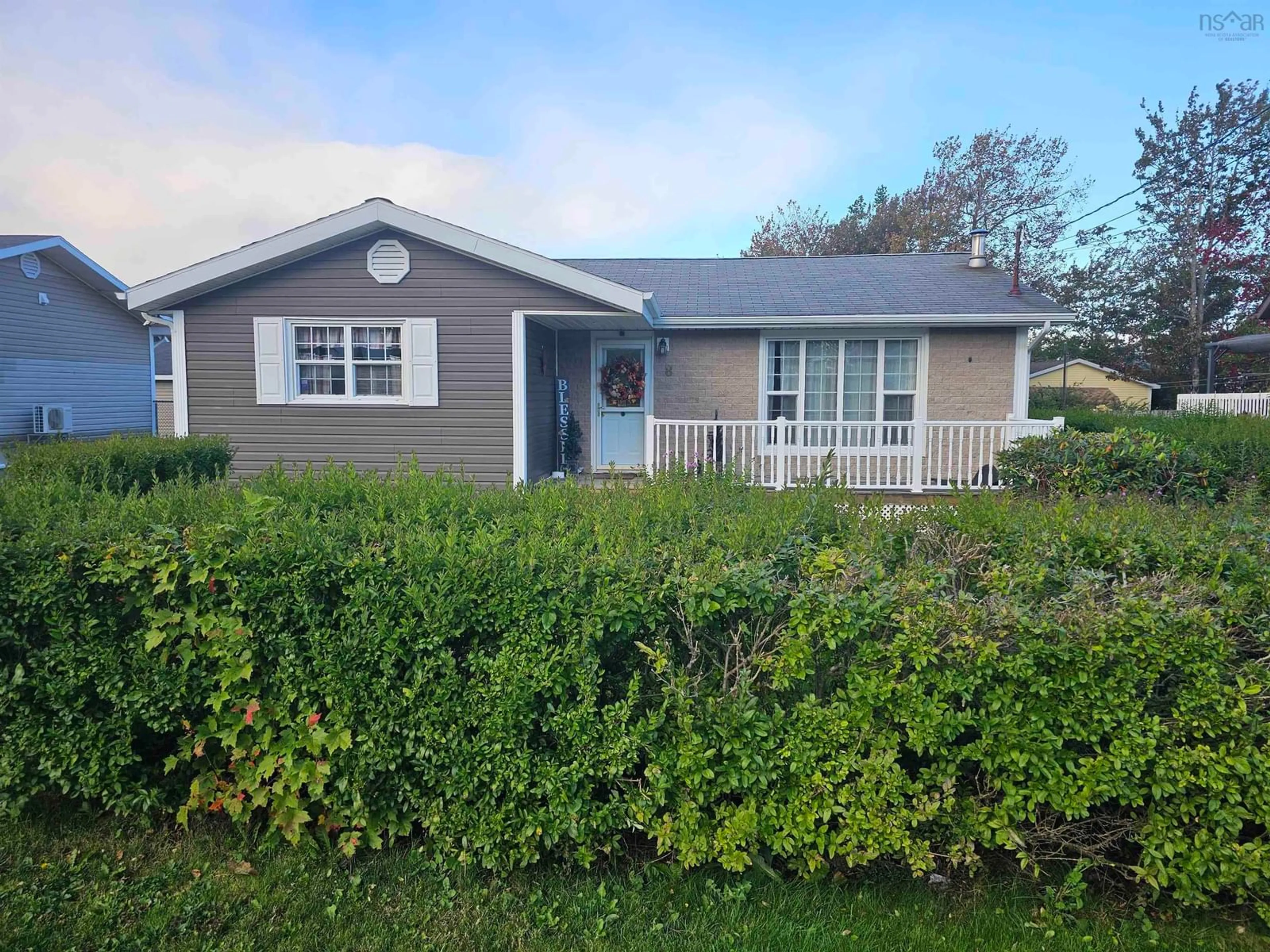 Home with vinyl exterior material, street for 8 Stacey Ave, North Sydney Nova Scotia B2A 3P4