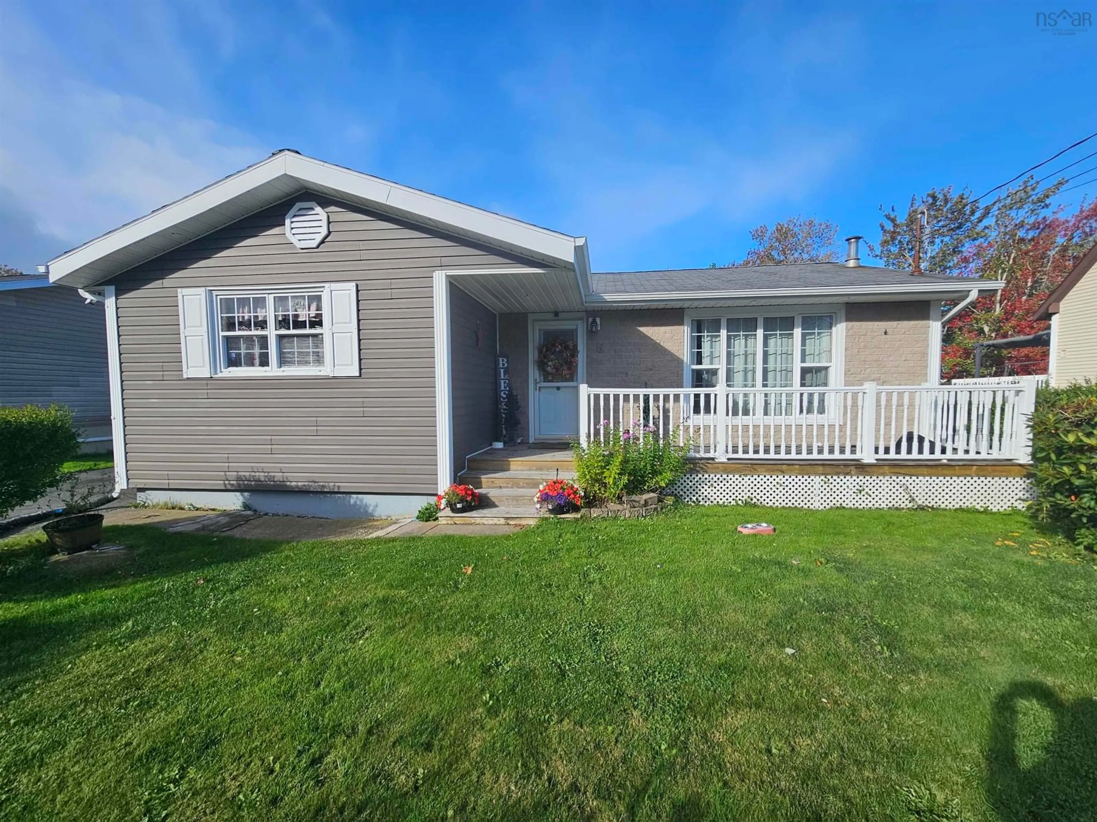 Home with vinyl exterior material, street for 8 Stacey Ave, North Sydney Nova Scotia B2A 3P4
