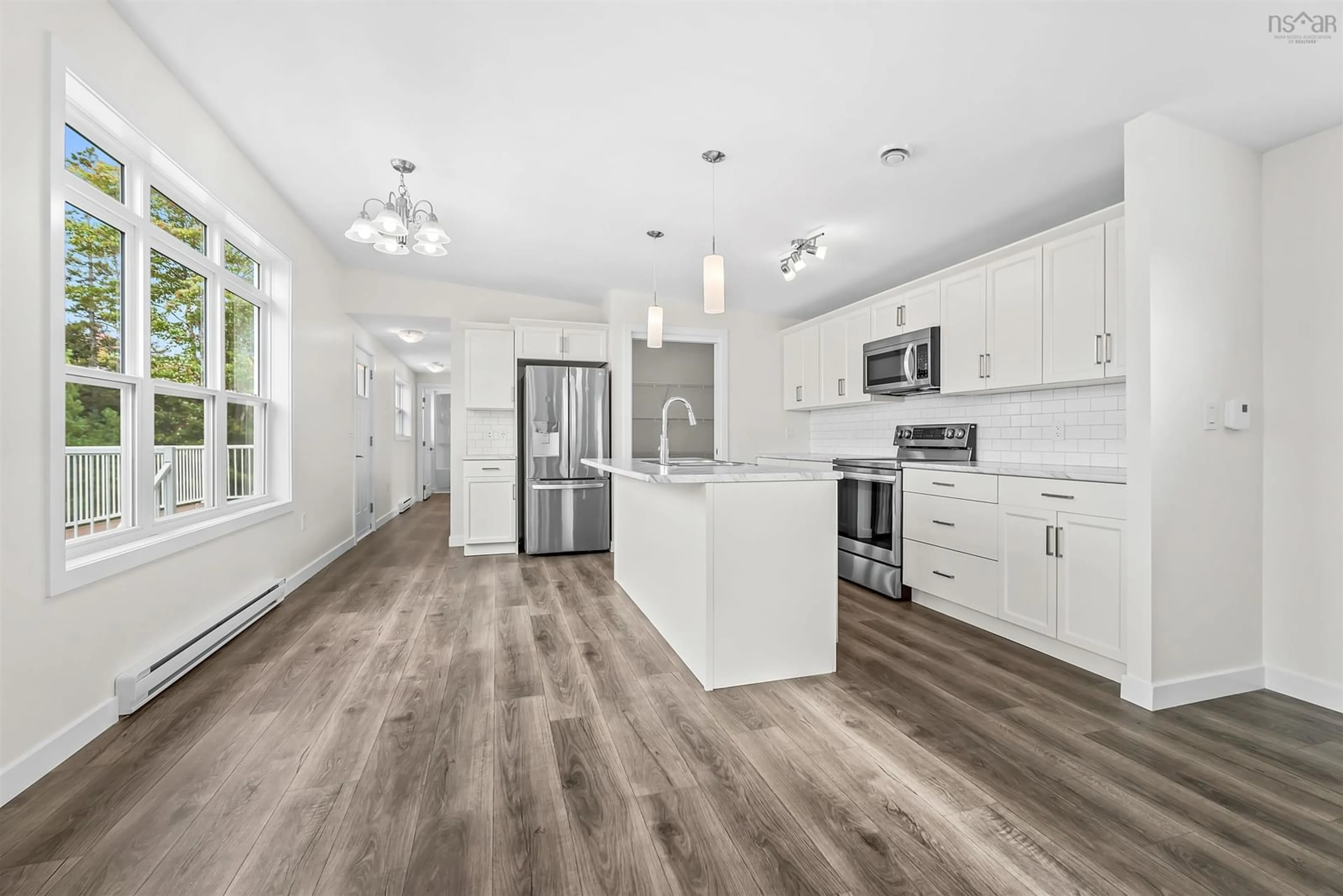 Open concept kitchen, wood/laminate floor for 80 Conway Dr, Elmsdale Nova Scotia B2S 0H4