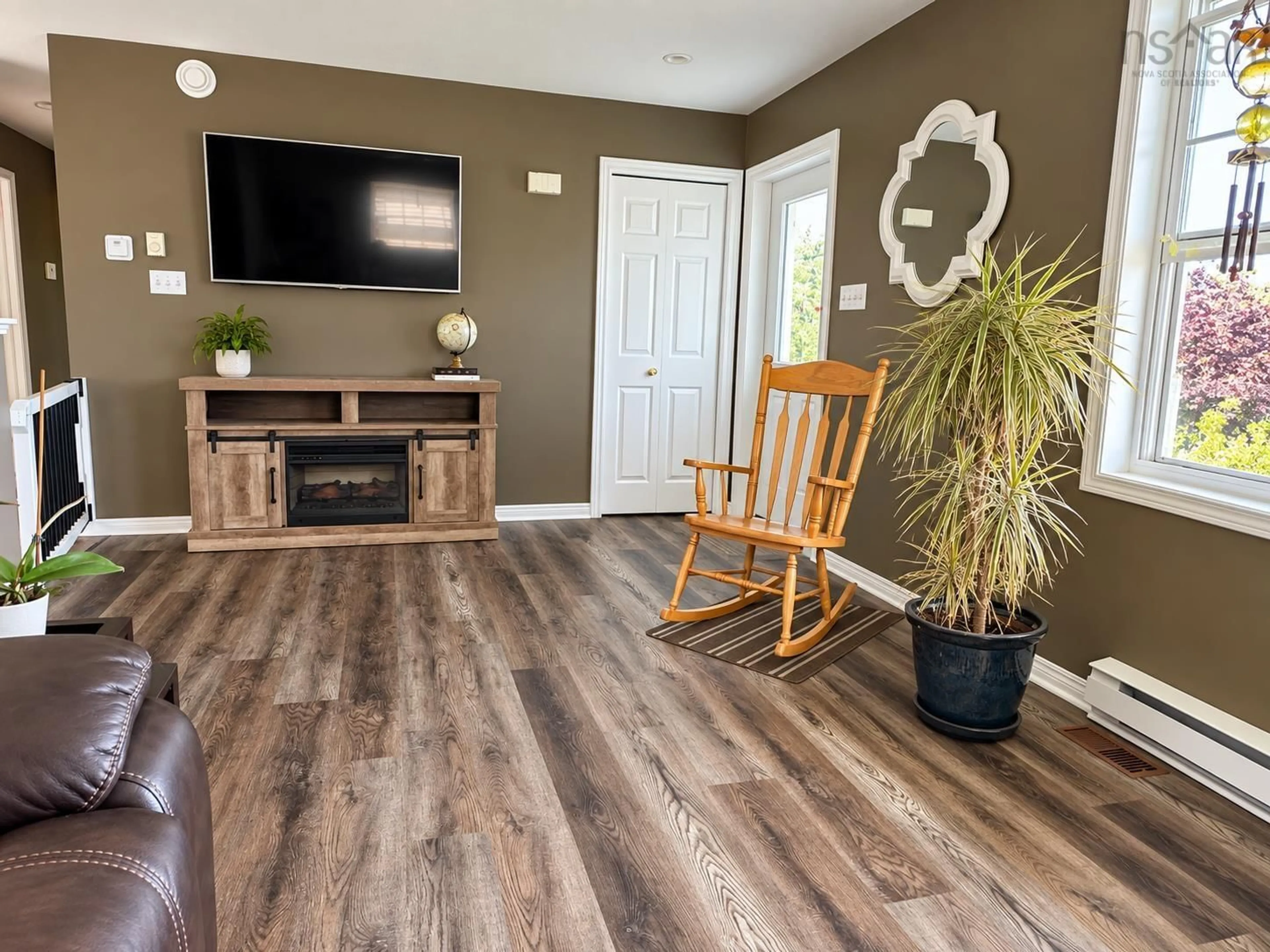 Living room with furniture, wood/laminate floor for 251 Nickerson Pond Rd, Brooklyn Nova Scotia B0J 1H0