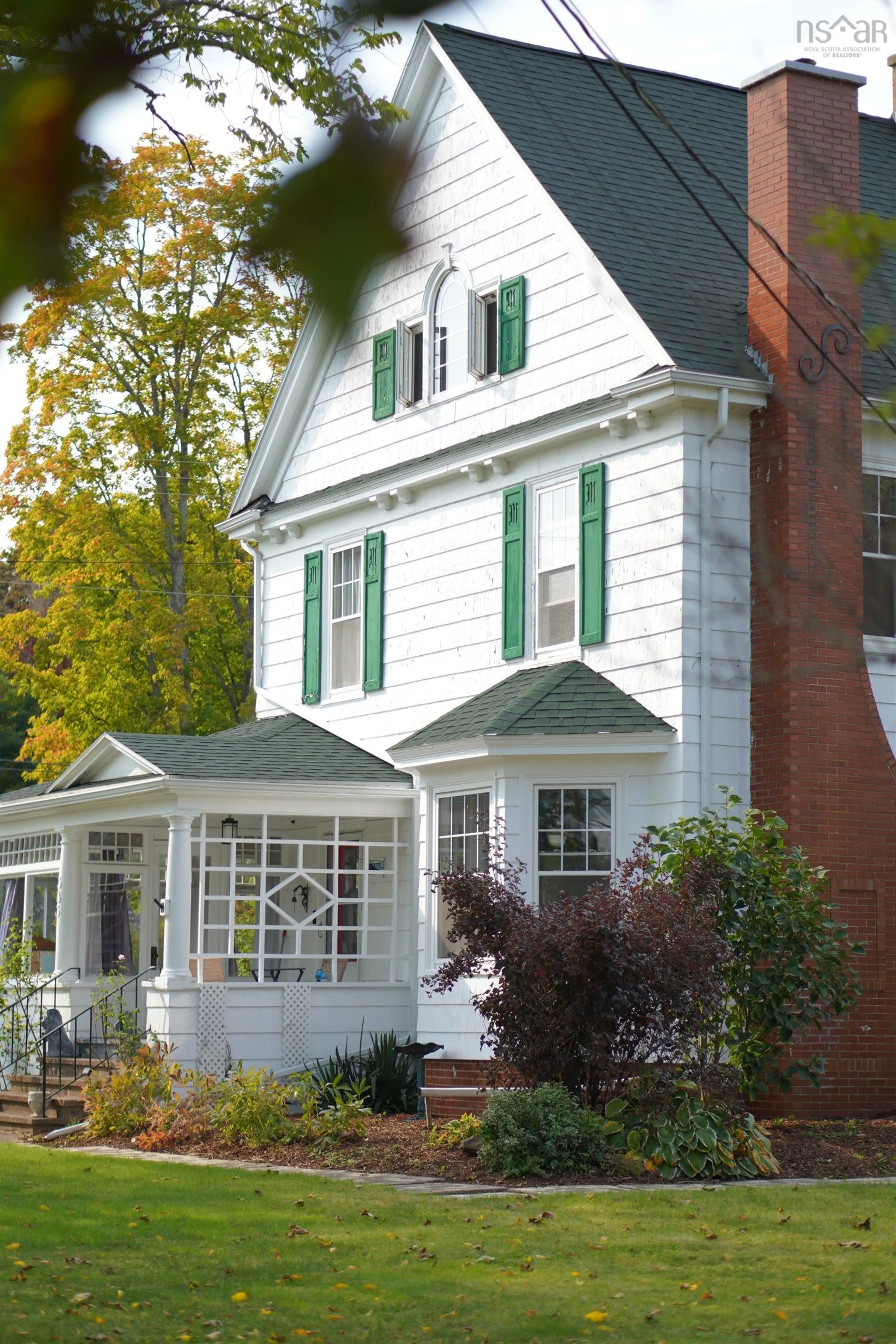 Home with vinyl exterior material, street for 383 Main St, Middleton Nova Scotia B0S 0B2