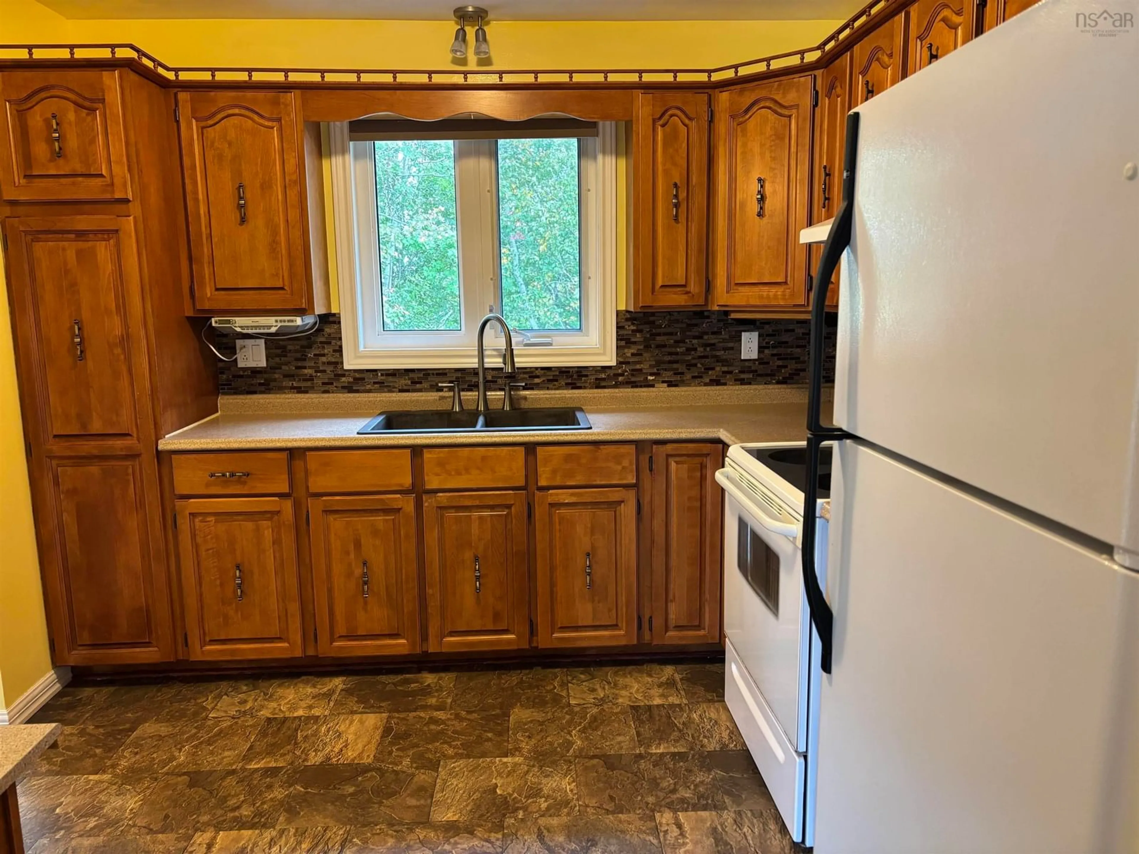 Standard kitchen, ceramic/tile floor for 10 Barshelmar Drive, Sydney Mines Nova Scotia B1V 3E2