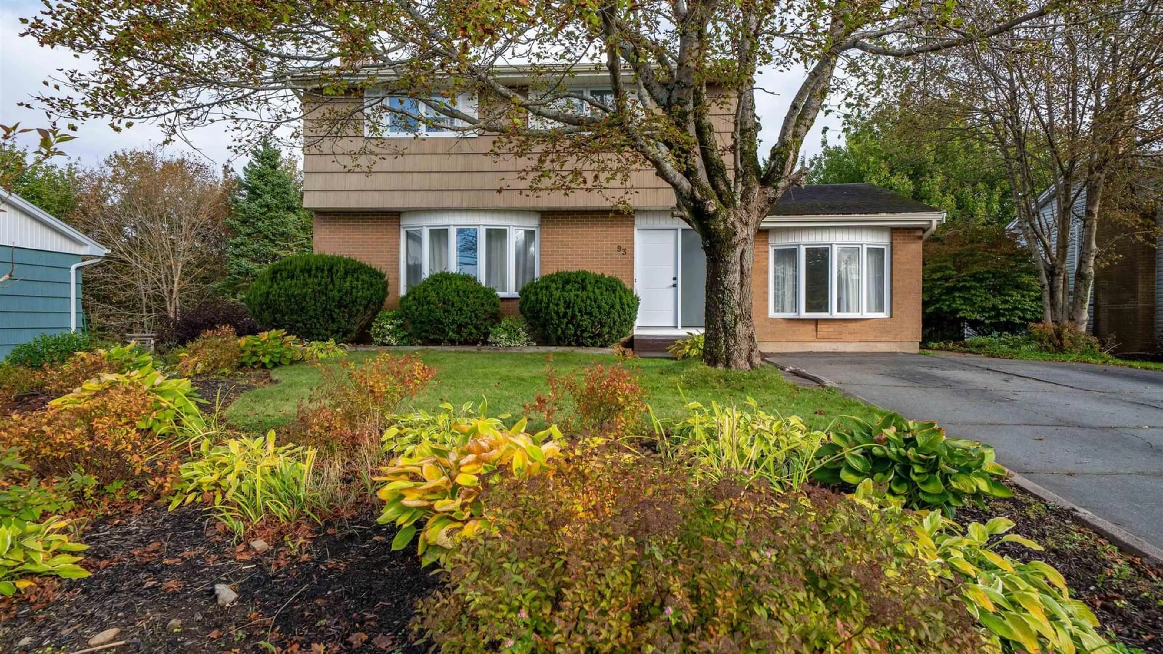 Home with vinyl exterior material, street for 93 Dorothea Dr, Woodlawn Nova Scotia B2W 2E7
