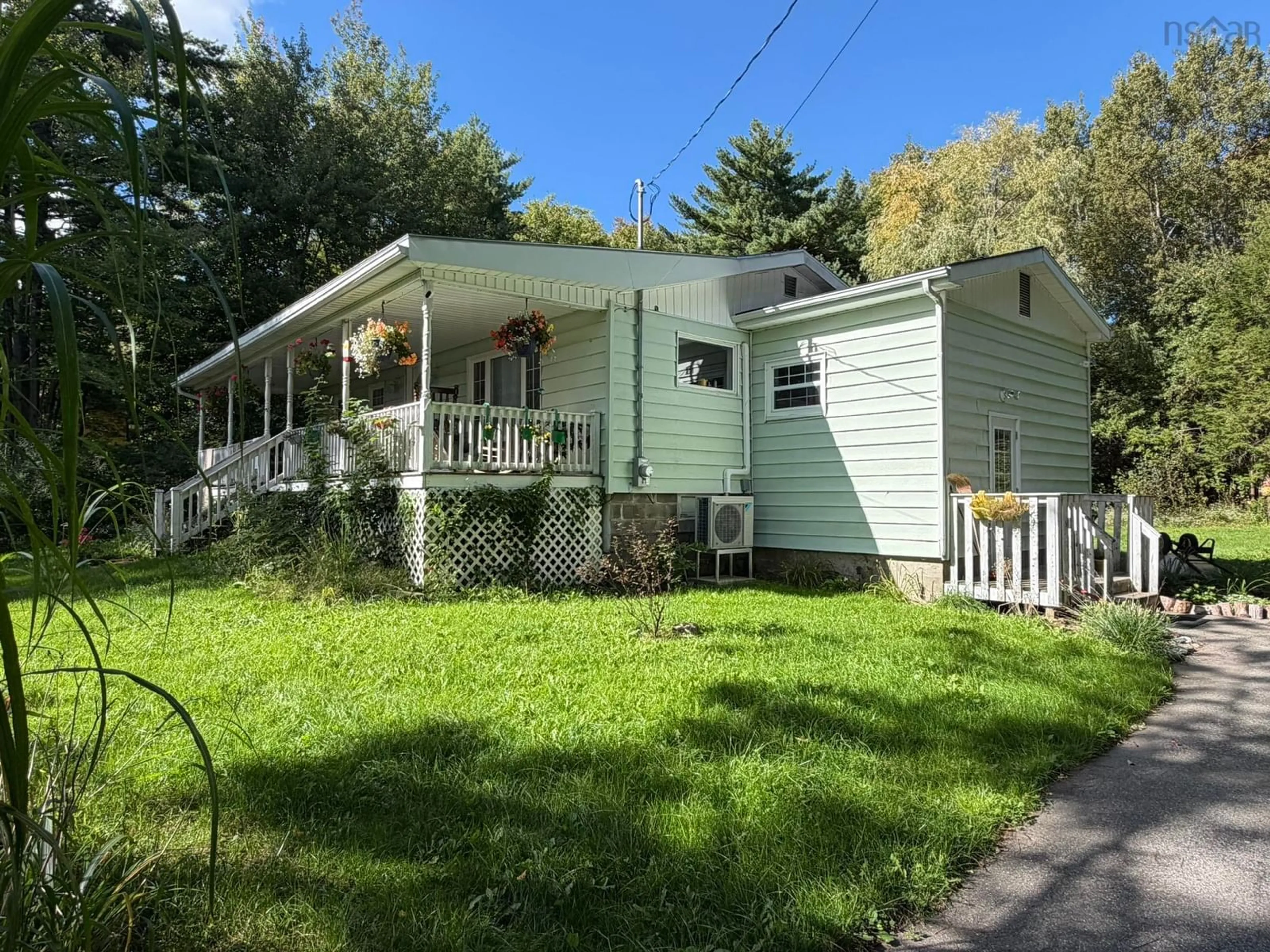 Home with vinyl exterior material, street for 19 River Rd, Milton Nova Scotia B0T 1P0