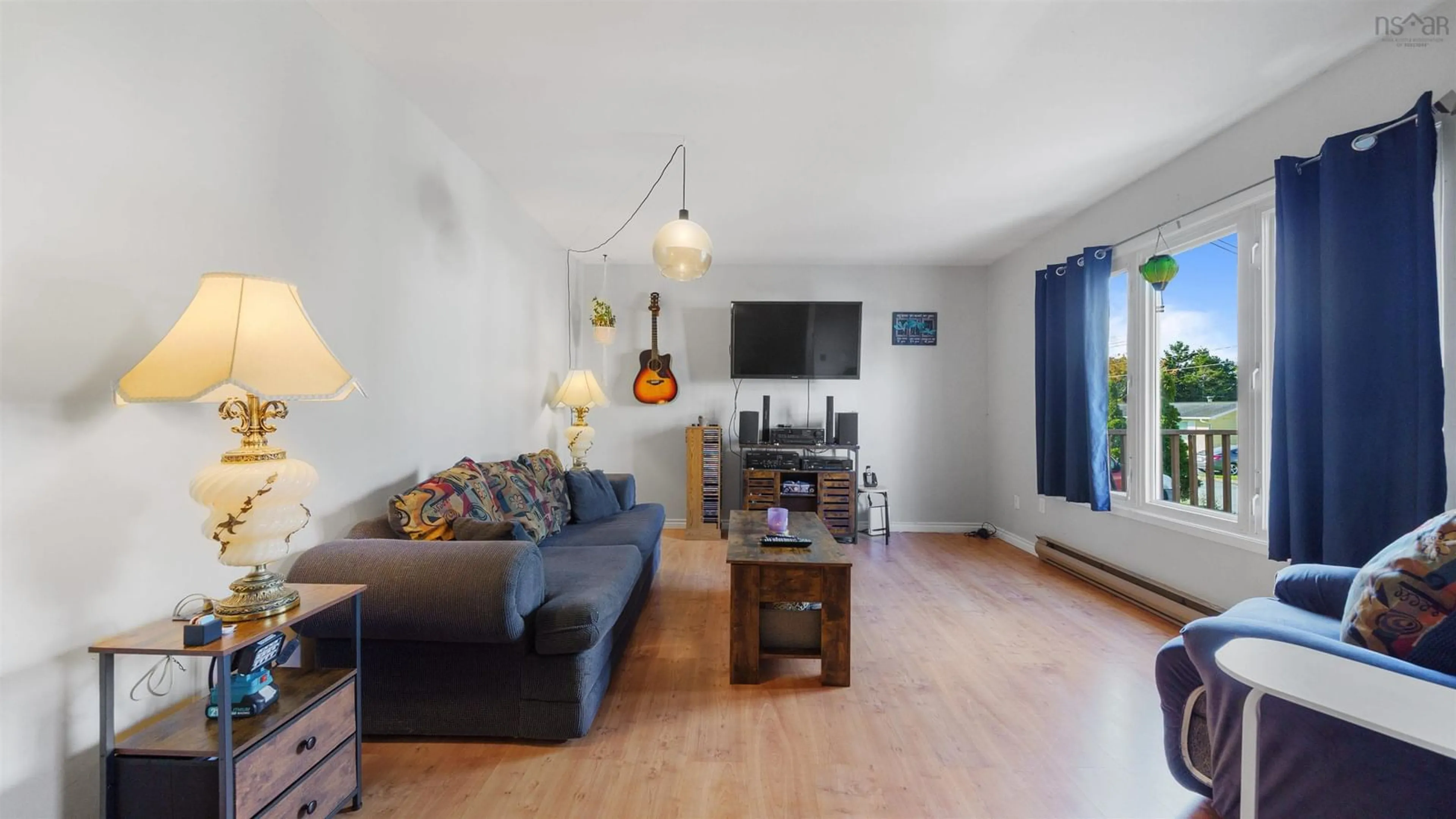 Living room with furniture, wood/laminate floor for 27 Tamerlane Crt, Forest Hills Nova Scotia B2W 4V3