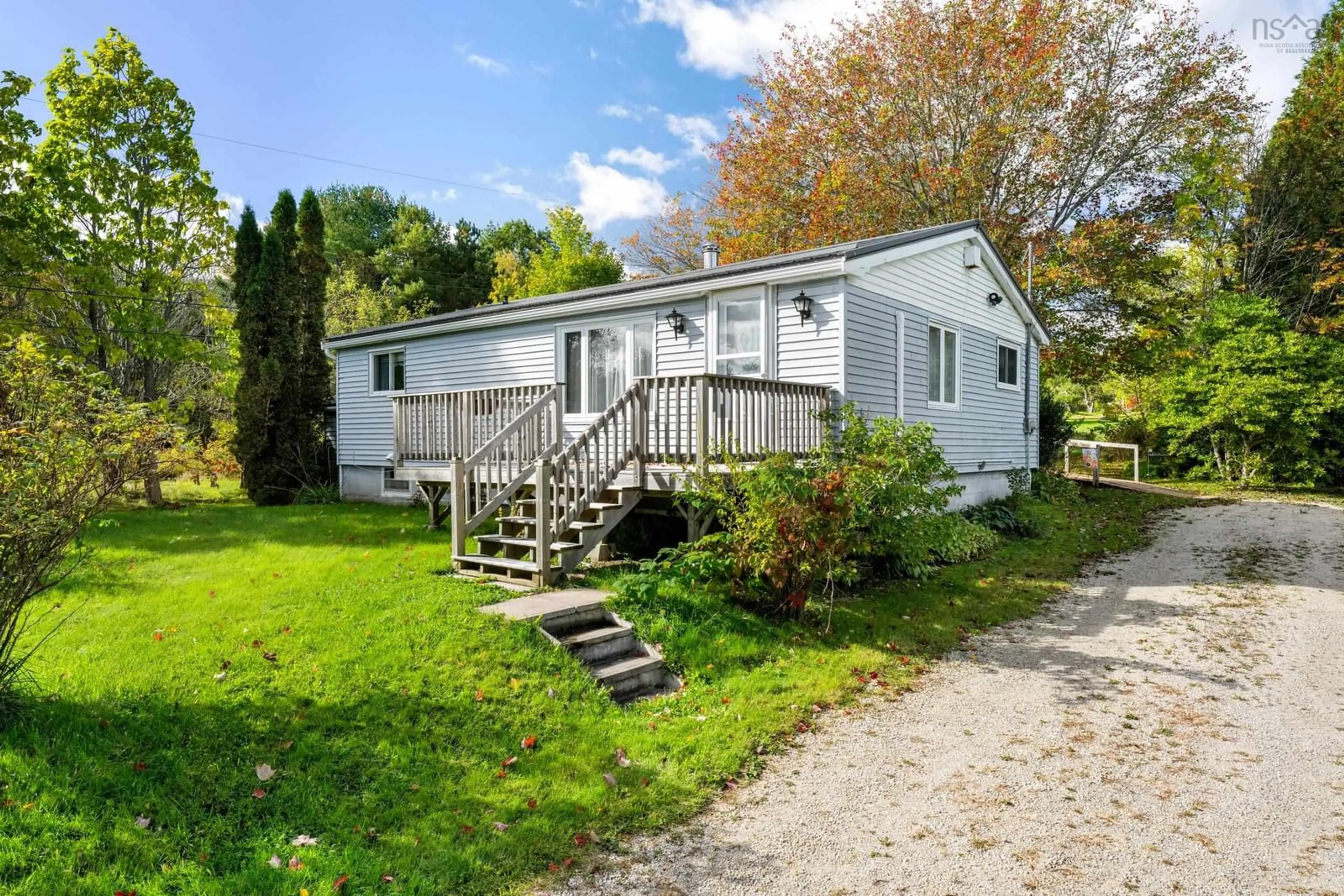 Home with vinyl exterior material, street for 6 North St, Western Shore Nova Scotia B0J 3M0