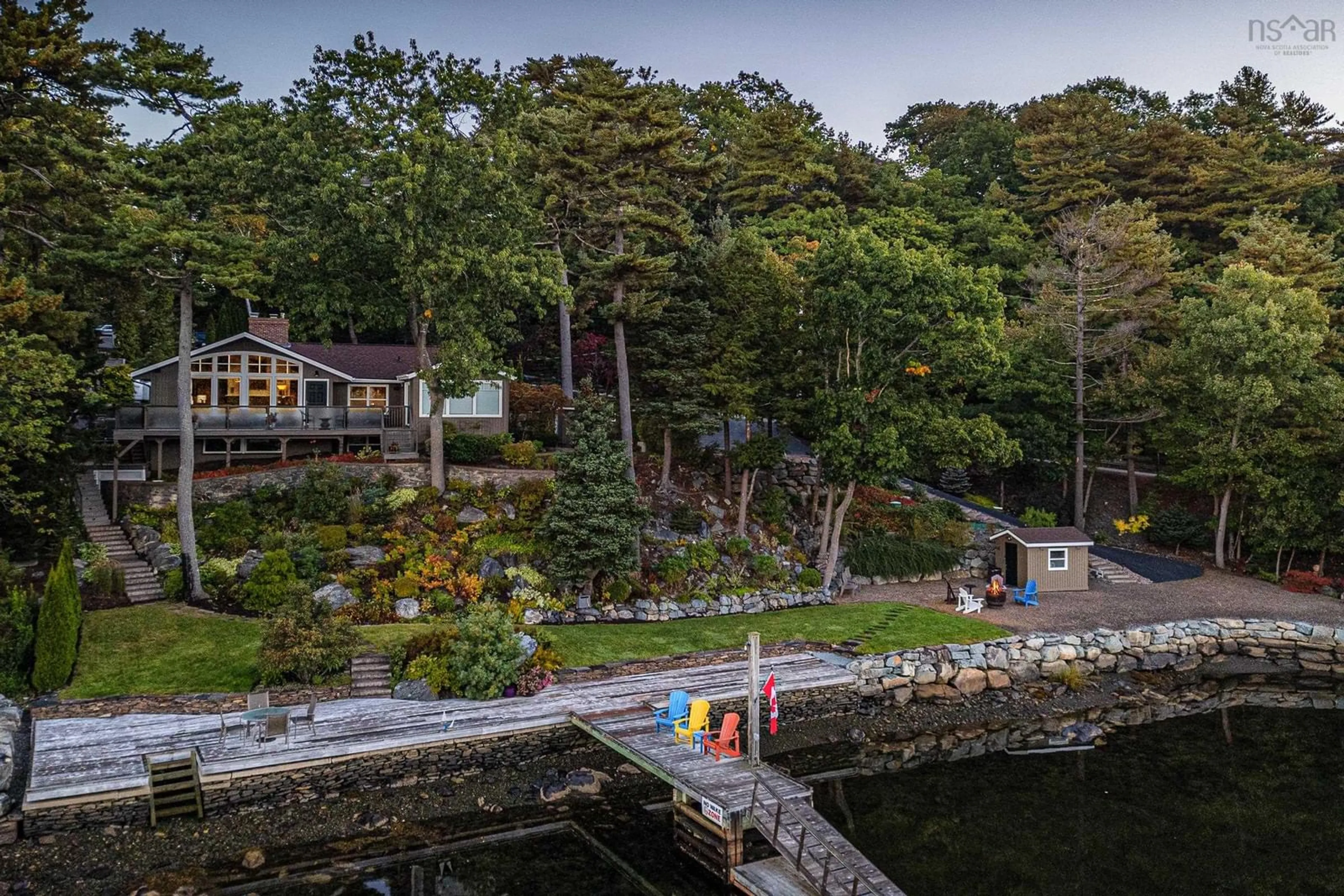 A pic from outside/outdoor area/front of a property/back of a property/a pic from drone, water/lake/river/ocean view for 1077 Shore Dr, Bedford Nova Scotia B4A 2E6