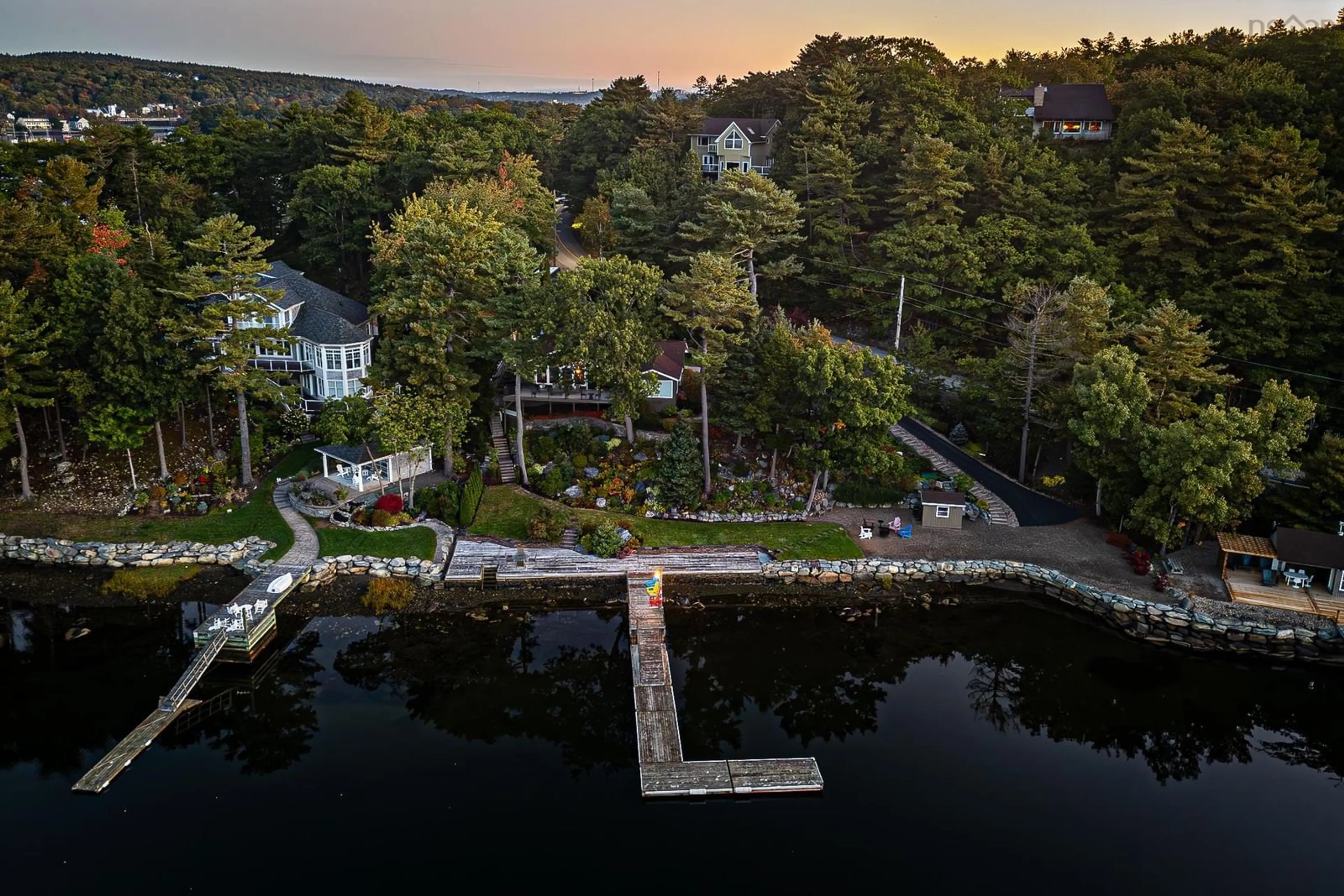 A pic from outside/outdoor area/front of a property/back of a property/a pic from drone, water/lake/river/ocean view for 1077 Shore Dr, Bedford Nova Scotia B4A 2E6