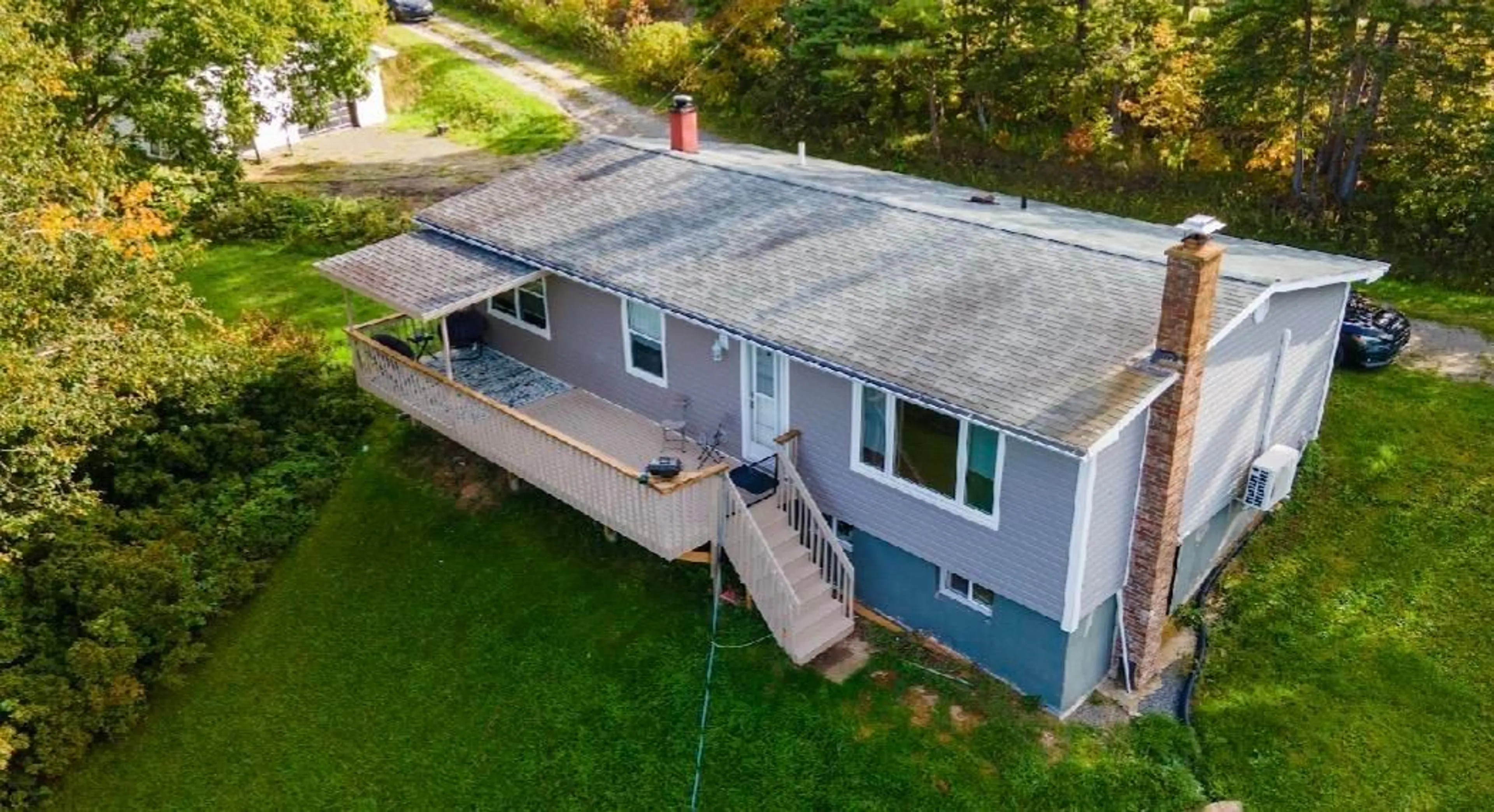A pic from outside/outdoor area/front of a property/back of a property/a pic from drone, building for 9512 East Bay Hwy, Irishvale Nova Scotia B1J 2B2