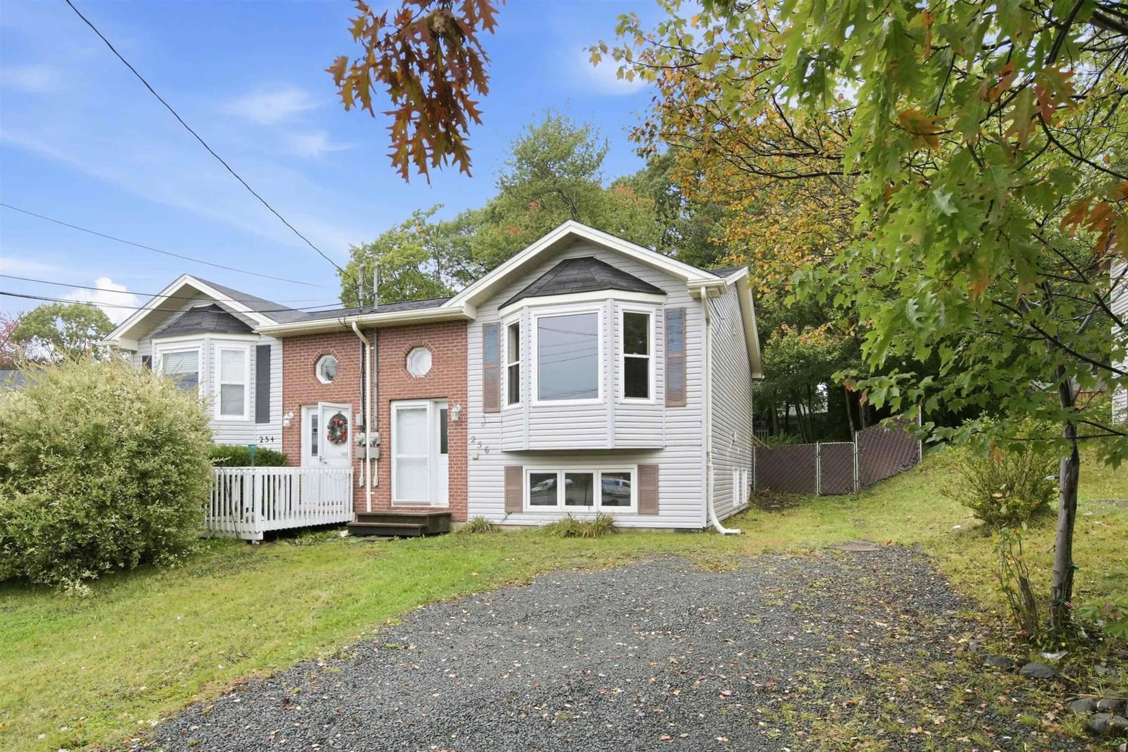 Home with vinyl exterior material, street for 256 Cobequid Rd., Lower Sackville Nova Scotia B4C 4C5